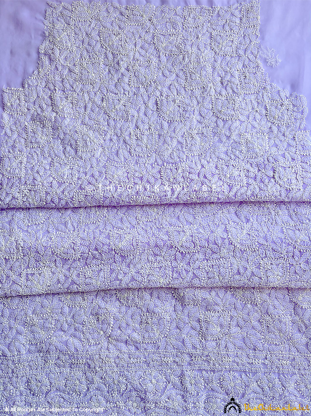 “Georgette chikankari suit material with dupatta highlighting traditional motifs and delicate threadwork”