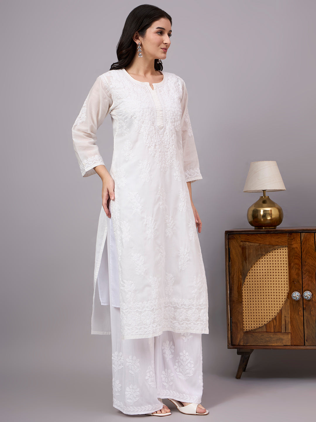 Comfortable regular wear Chikankari Kurta made from premium cotton fabric with handcrafted embroidery and an attached inner for enhanced comfort and coverage.