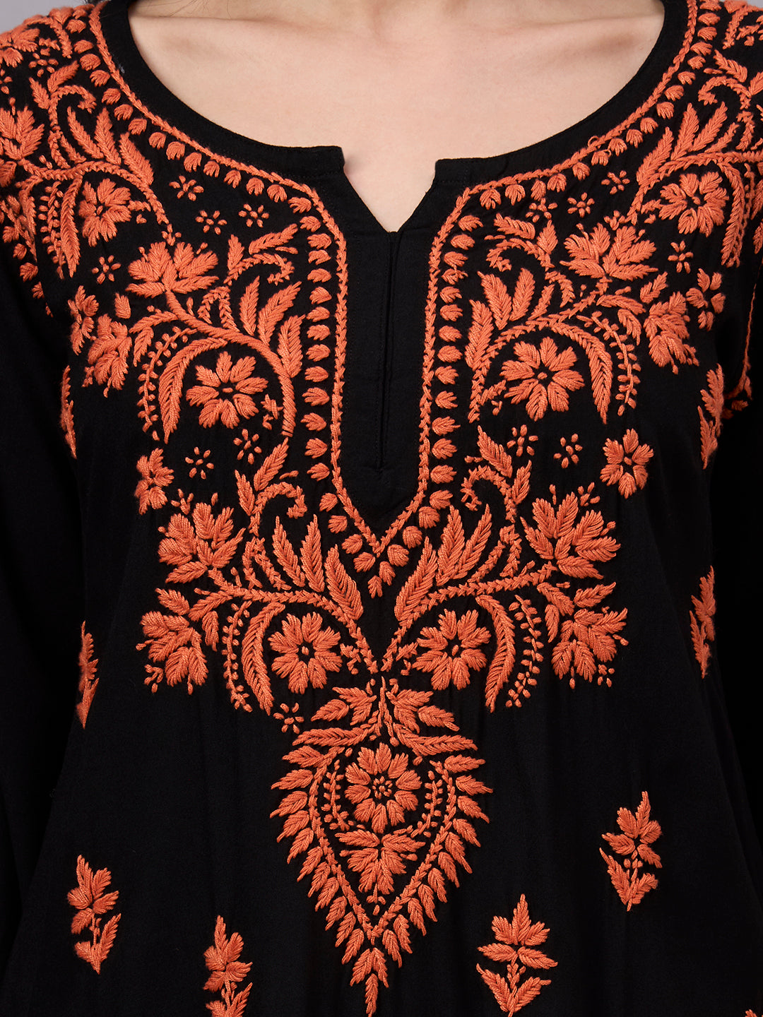 Premium Chikankari kurti crafted from soft rayon fabric with intricate handcrafted embroidery, offering a stylish and comfortable regular wear top for women.