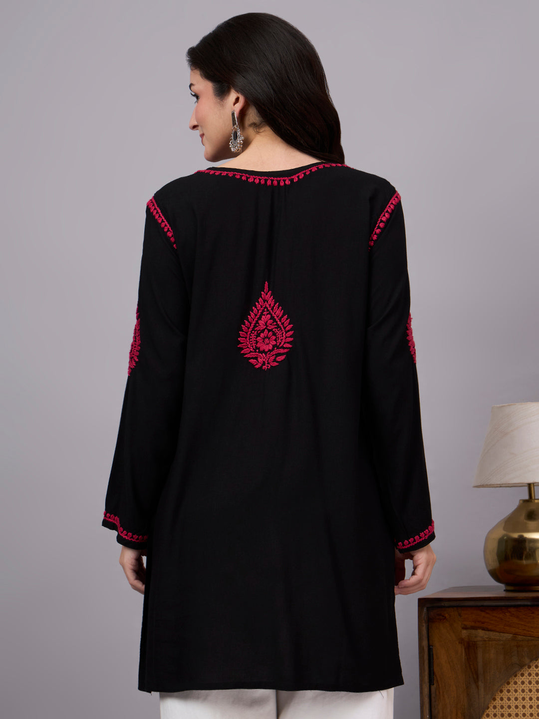 Designer comfortable regular wear top made from premium rayon with traditional Chikankari embroidery, blending ethnic craftsmanship with modern comfort.