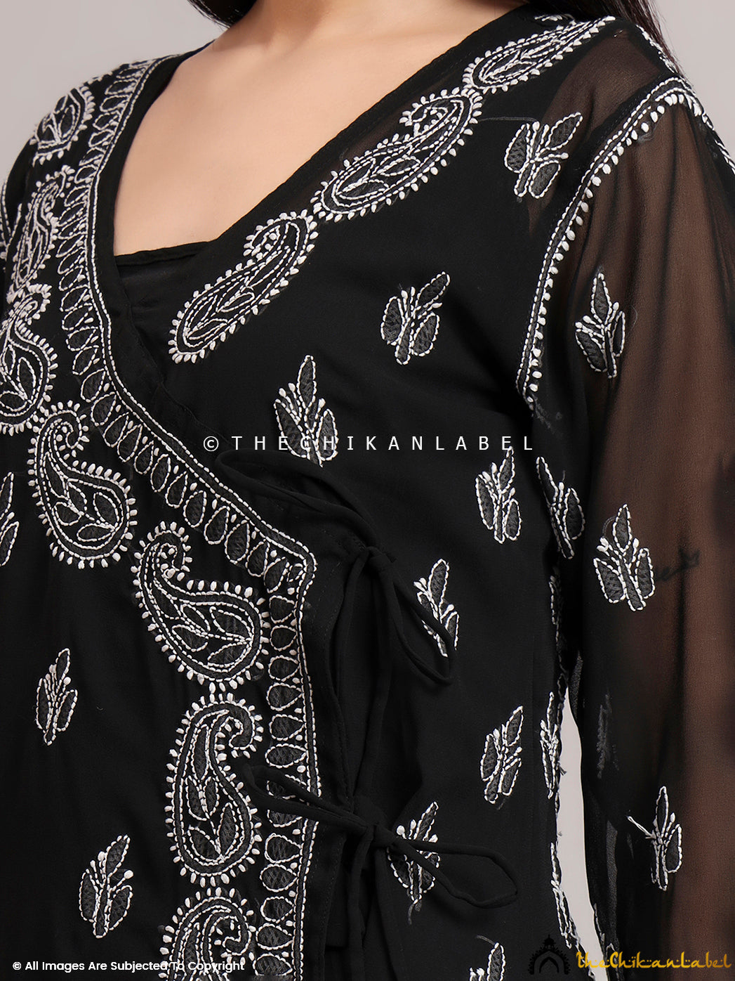 Flowing Angrakha kurta made from breathable georgette fabric, featuring intricate Chikankari details ideal for summer ethnic wear