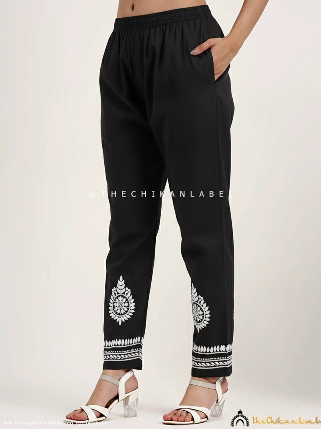 Comfortable cotton chikankari kurta pant set with beautiful neckline embroidery and embroidered sleeves for classy ethnic styling