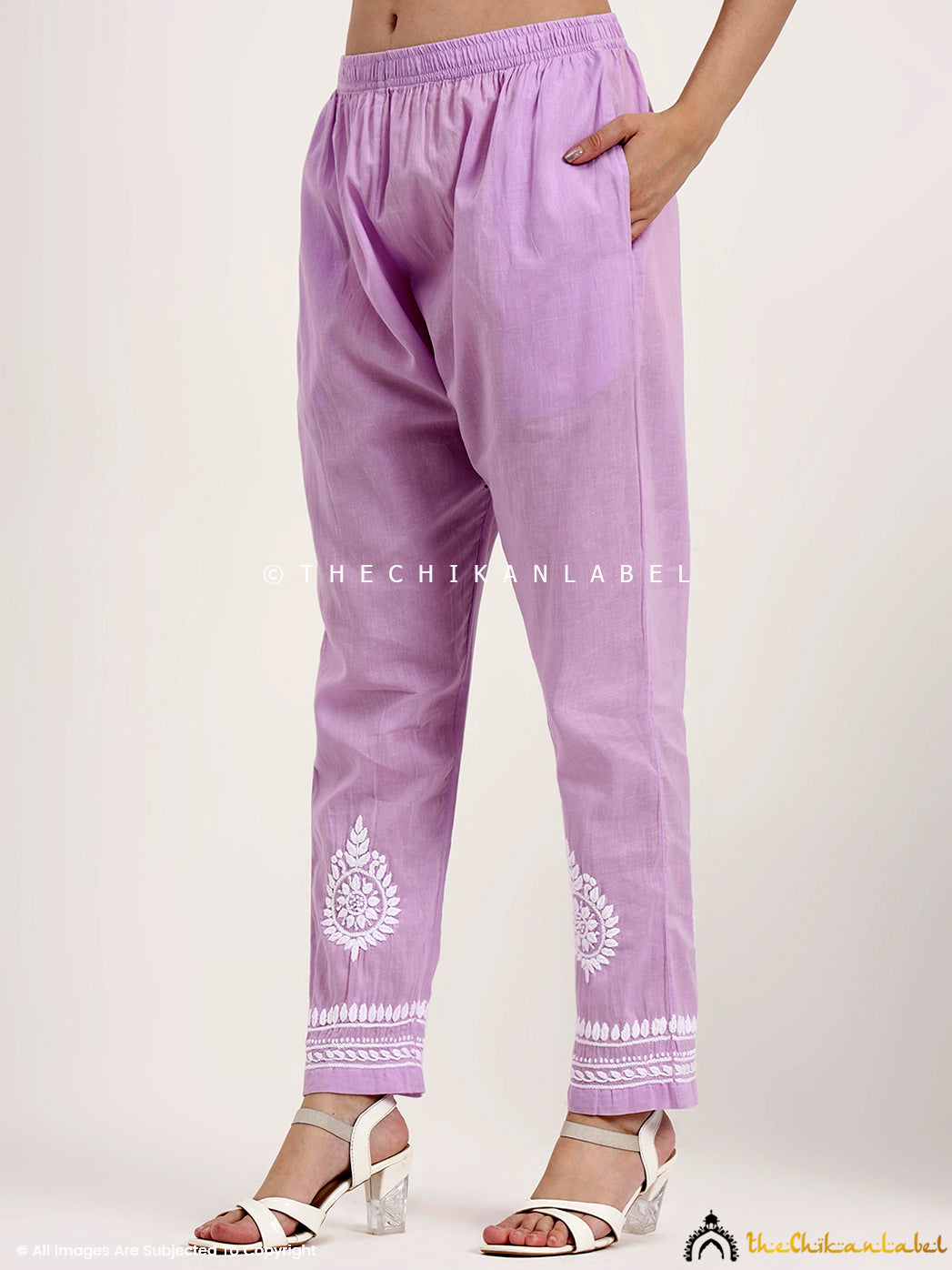 Lightweight chikankari kurta set with breathable khadi cotton fabric and delicate embroidery for timeless elegance.