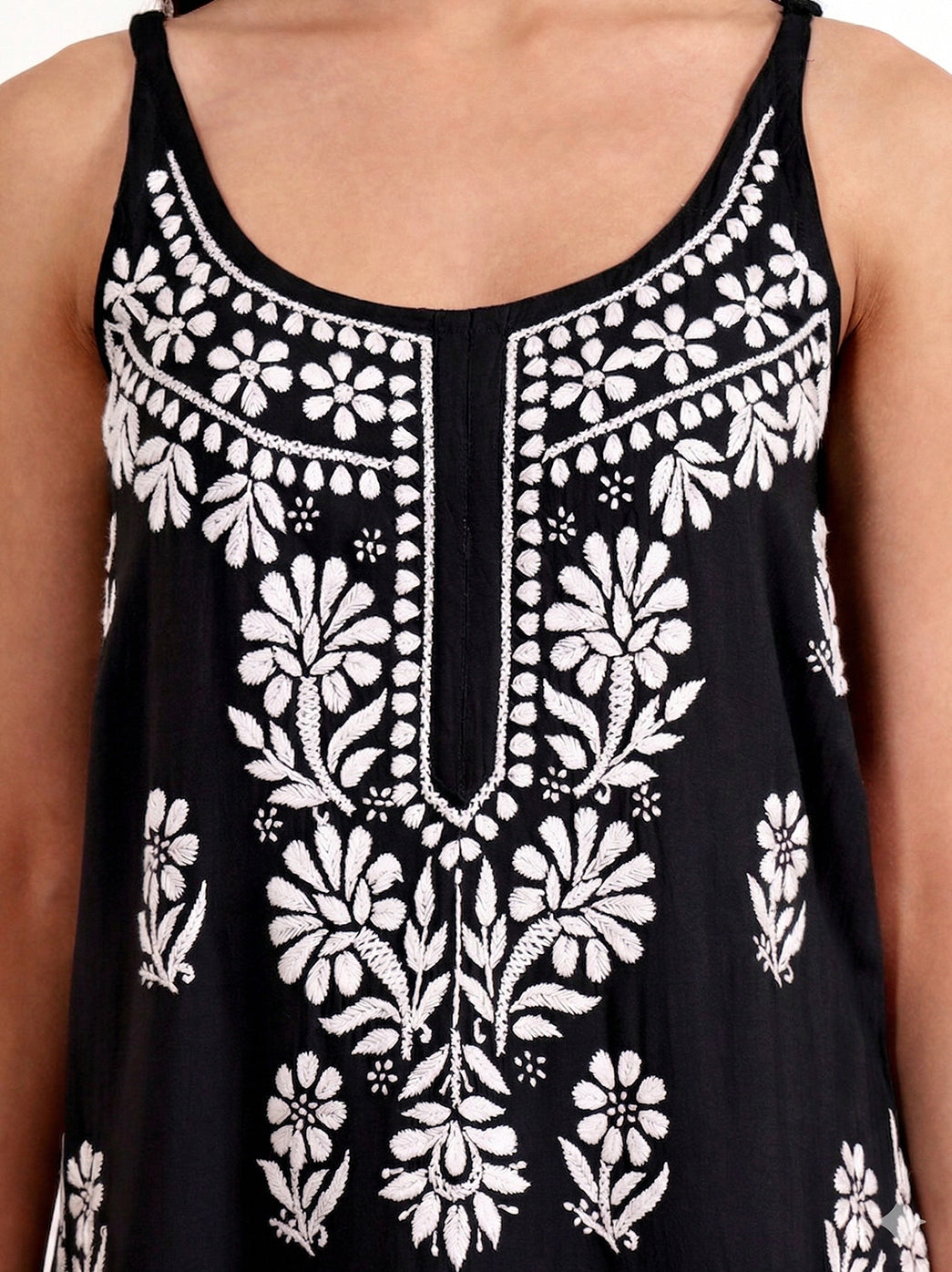 Elegant chikankari strappy kurta featuring detailed neckline embroidery and long straight cut