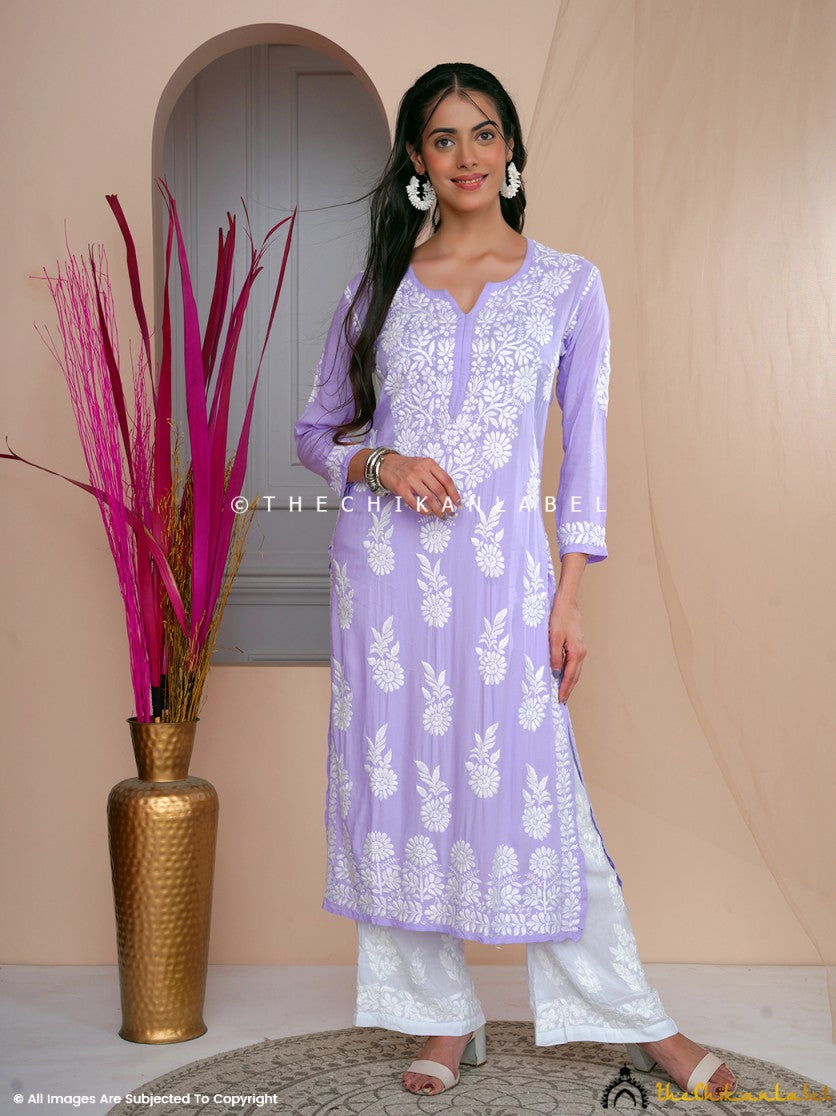 Woman wearing lavender hand-embroidered chikankari kurti