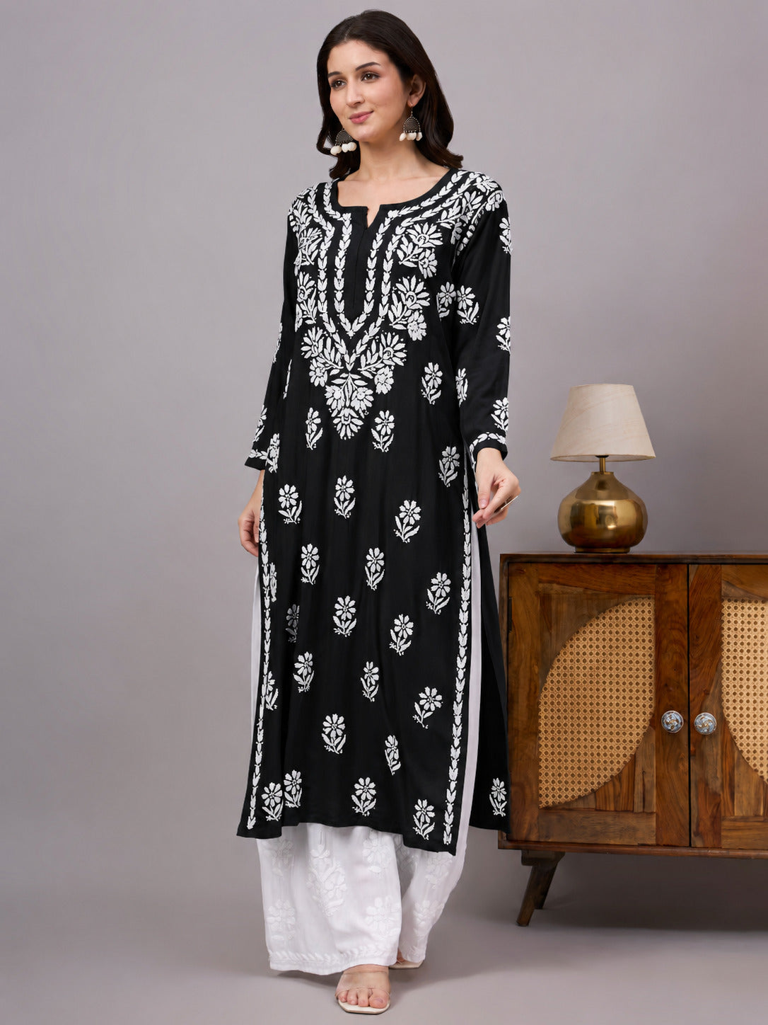 Women's handcrafted Rayon Straight Kurti featuring authentic Lucknow Chikankari embroidery, breathable fabric, straight silhouette, and elegant ethnic design for everyday wear.