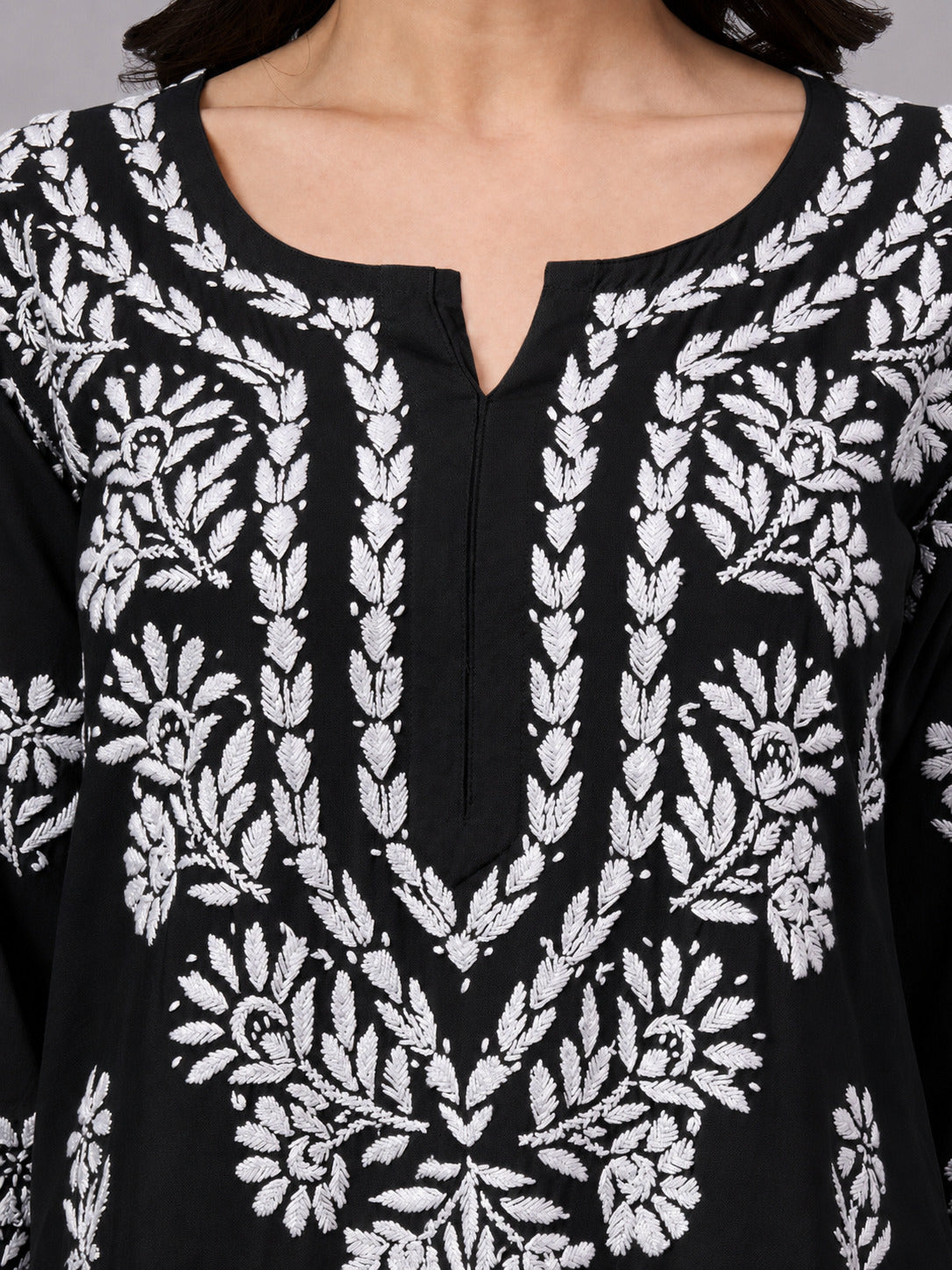 Premium Chikankari Kurta for women crafted from soft rayon fabric with intricate handcrafted embroidery, making it a comfortable regular wear kurti for office and casual outings.