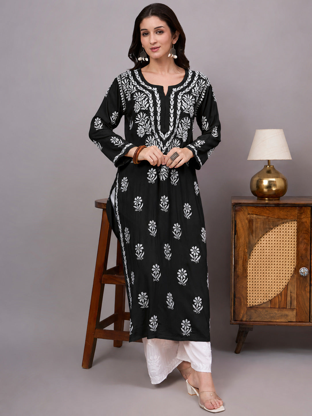 Elegant women's Chikankari Kurta showcasing authentic handcrafted floral embroidery on premium rayon fabric, designed for comfort, style, and all-day wear.