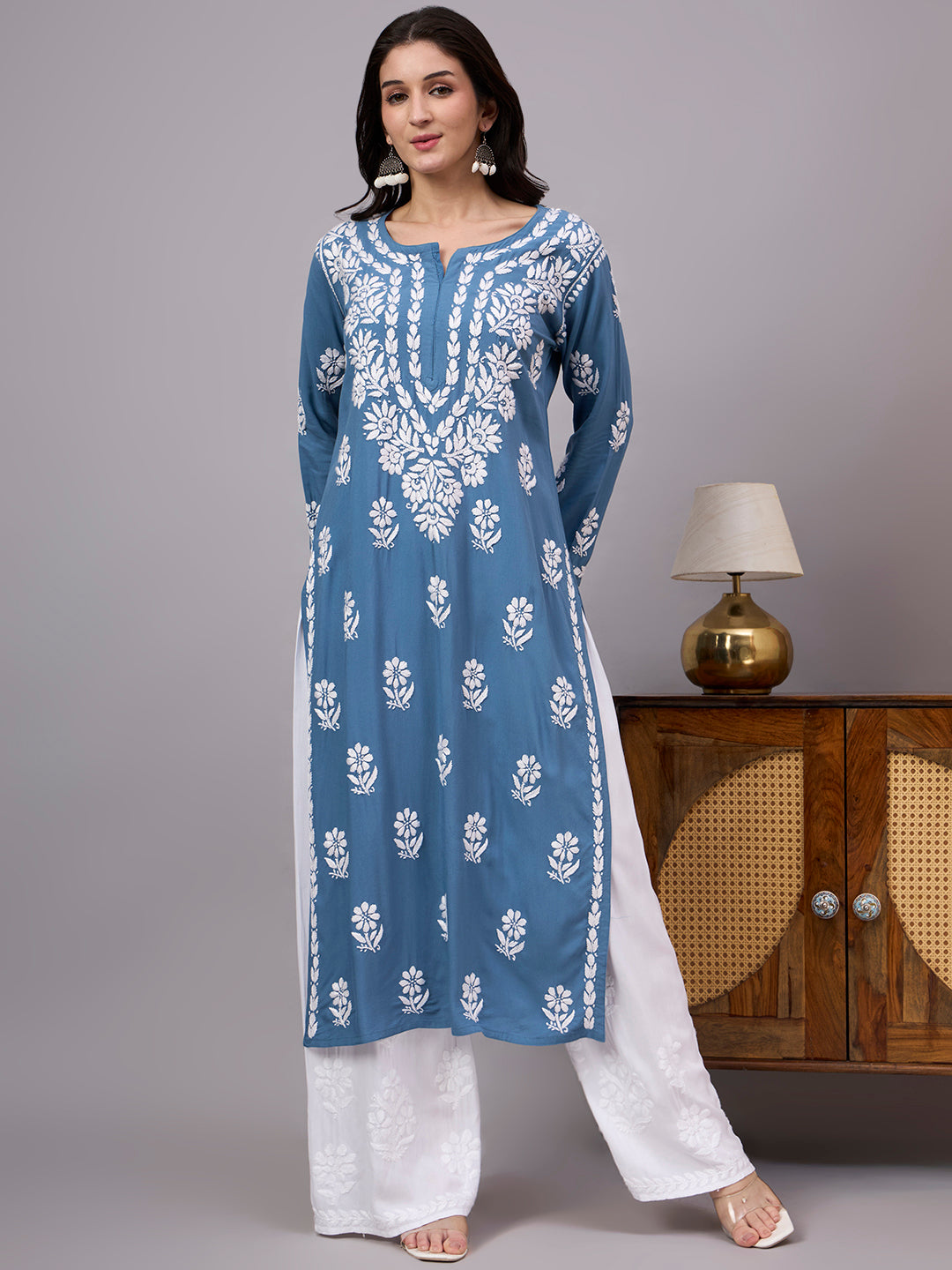 Women's handcrafted Rayon Straight Kurti featuring authentic Lucknow Chikankari embroidery, breathable fabric, straight silhouette, and elegant ethnic design for everyday wear.
