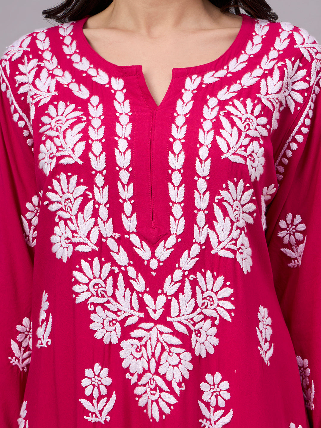 Women's handcrafted Rayon Straight Kurti featuring authentic Lucknow Chikankari embroidery, breathable fabric, straight silhouette, and elegant ethnic design for everyday wear.