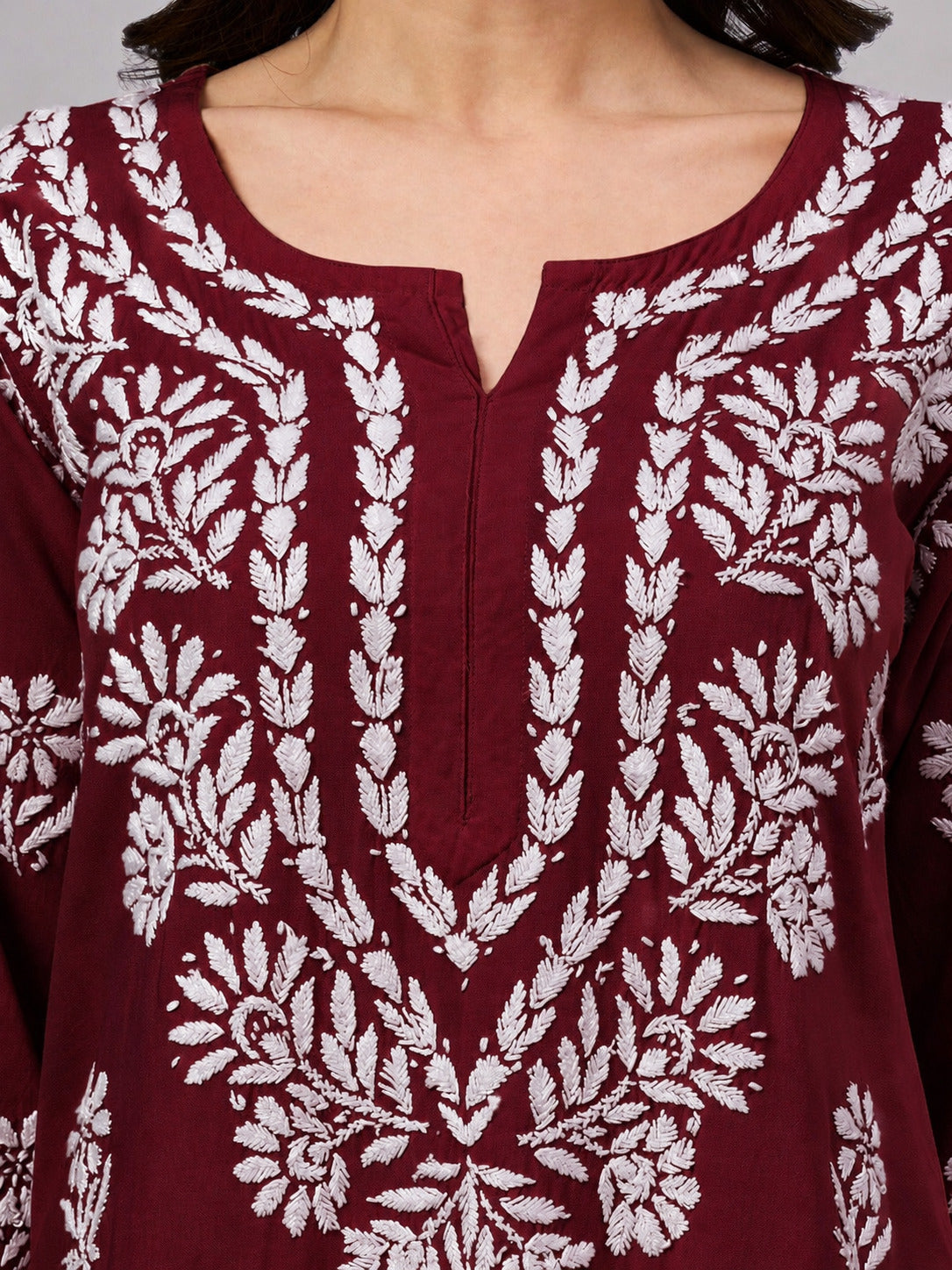Women's ethnic Chikankari Kurta featuring handcrafted floral embroidery, breathable rayon fabric, and a flattering straight-cut design for everyday fashion.