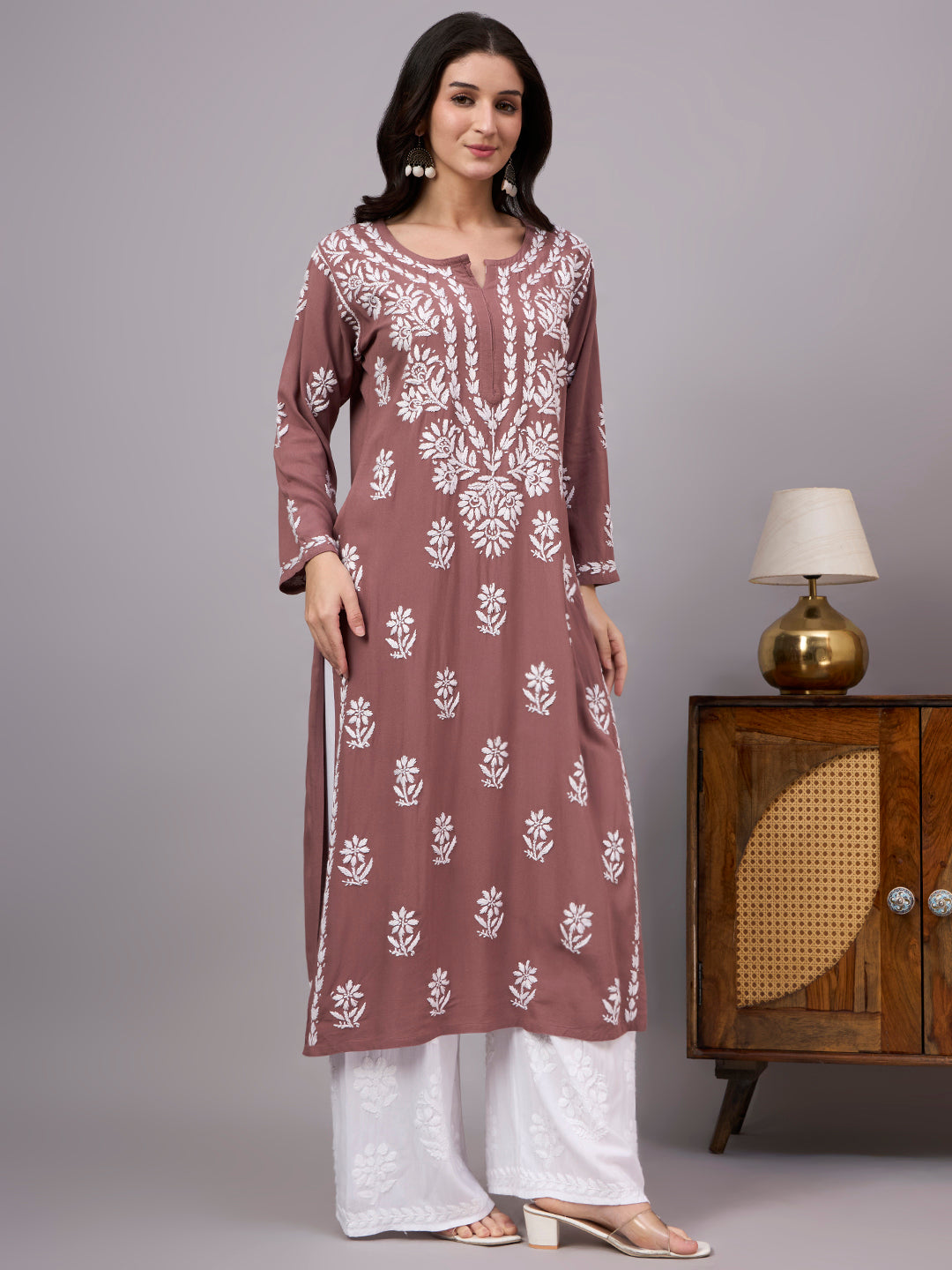Women's trending kurti featuring authentic Lucknow Chikankari embroidery, soft rayon construction, straight silhouette, and versatile styling for every occasion.