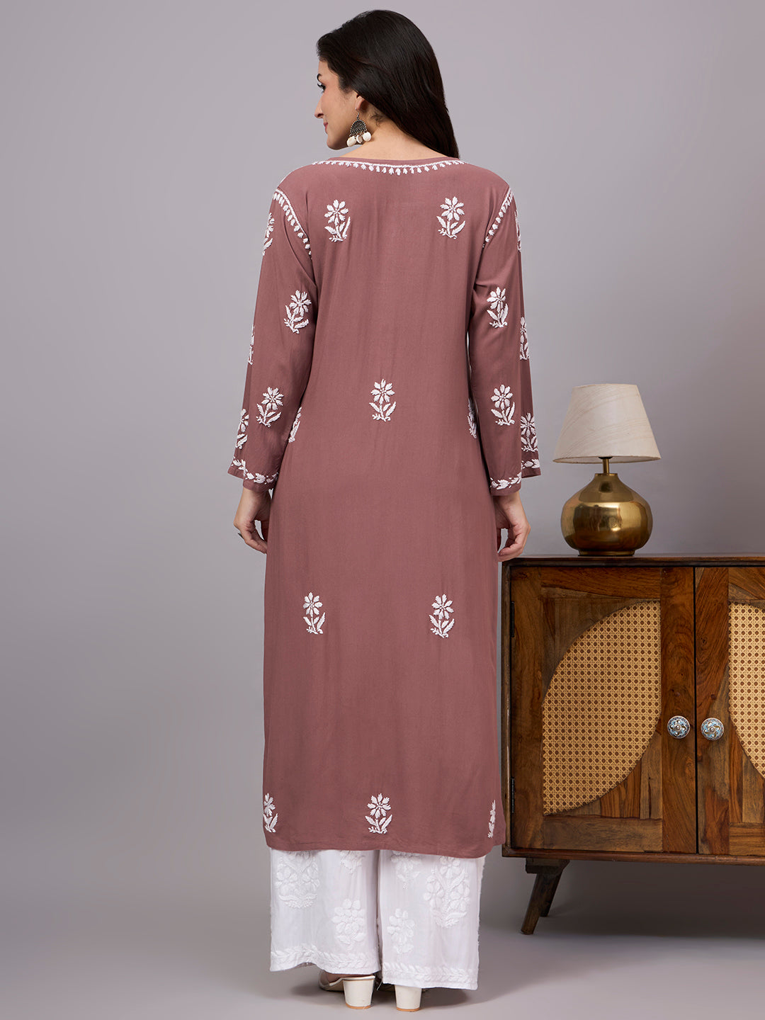 Stylish Rayon Straight Kurti with handcrafted Chikankari embroidery, comfortable regular fit, breathable fabric, and classic ethnic appeal for women seeking timeless fashion.