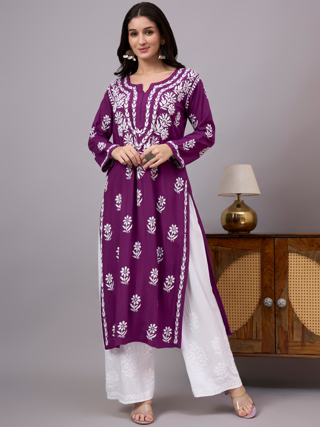 Women's handcrafted Rayon Straight Kurti featuring authentic Lucknow Chikankari embroidery, breathable fabric, straight silhouette, and elegant ethnic design for everyday wear.