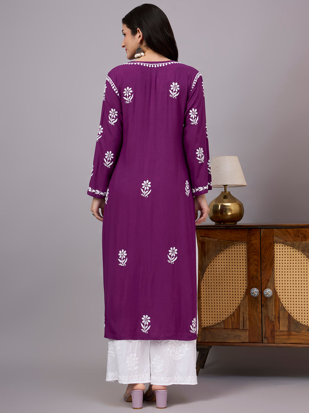 Traditional Rayon Straight Kurti crafted by skilled artisans with authentic Chikankari embroidery, offering breathable comfort, elegant styling, and versatile ethnic fashion for women.