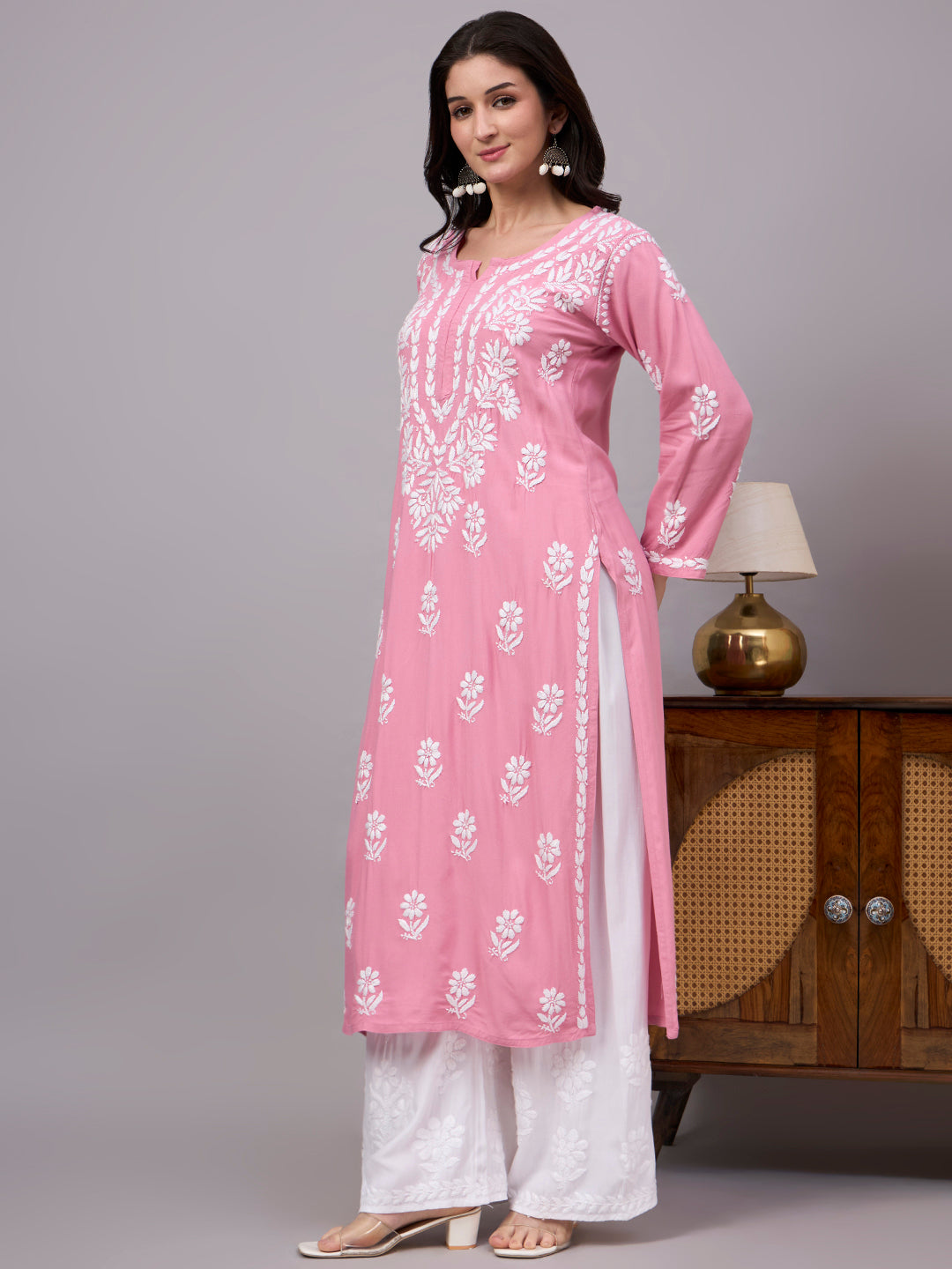 Women's ethnic Chikankari Kurta featuring handcrafted floral embroidery, breathable rayon fabric, and a flattering straight-cut design for everyday fashion.