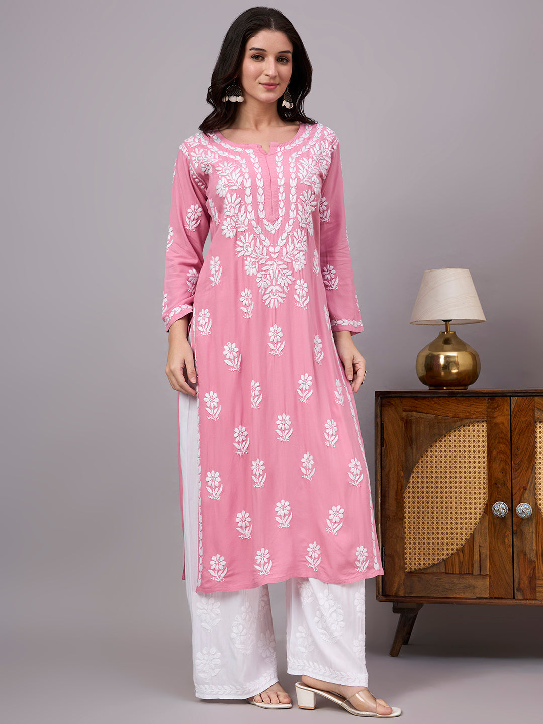 Elegant women's Chikankari Kurta showcasing authentic handcrafted floral embroidery on premium rayon fabric, designed for comfort, style, and all-day wear.