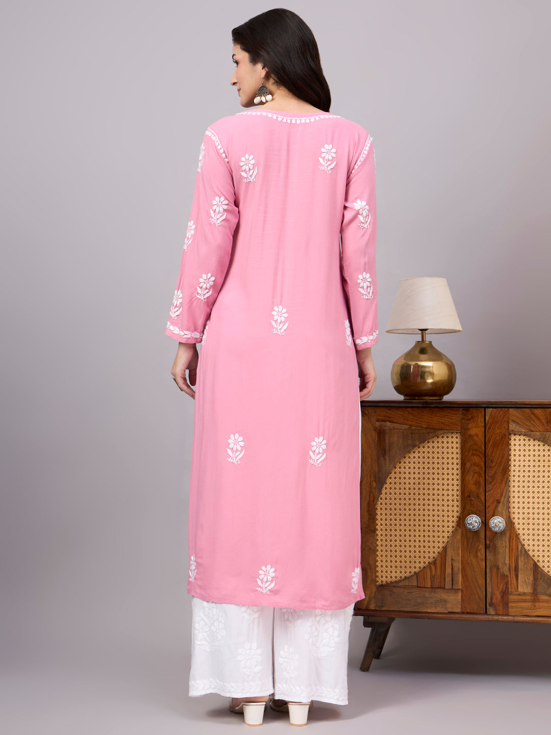 Premium women's Chikankari Kurta crafted from soft rayon fabric with intricate floral embroidery, making it an ideal comfortable regular wear kurti.