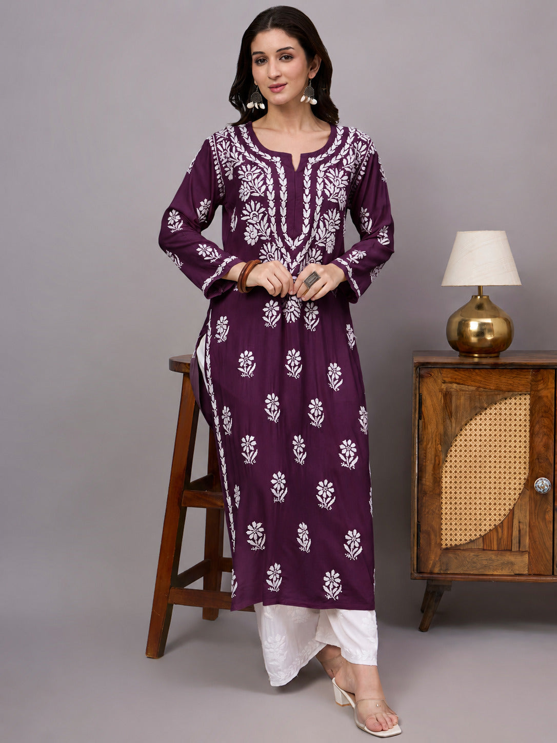 Handcrafted Chikankari Kurta for women featuring intricate artisan embroidery, breathable rayon fabric, full sleeves, and elegant straight-cut styling for effortless comfort.