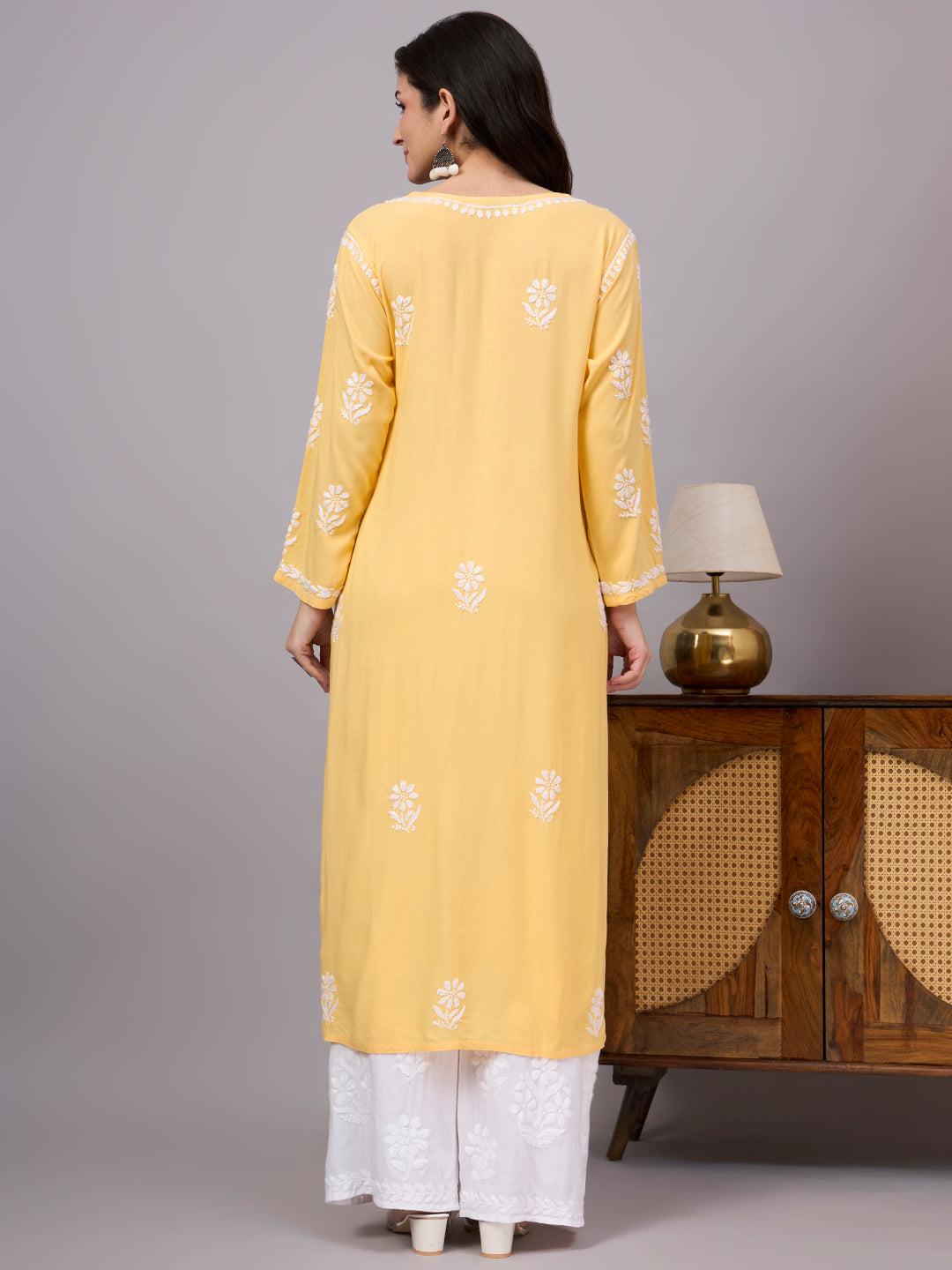 Authentic Chikankari Kurta for women featuring artisan-crafted floral embroidery on soft rayon fabric with an elegant straight fit.