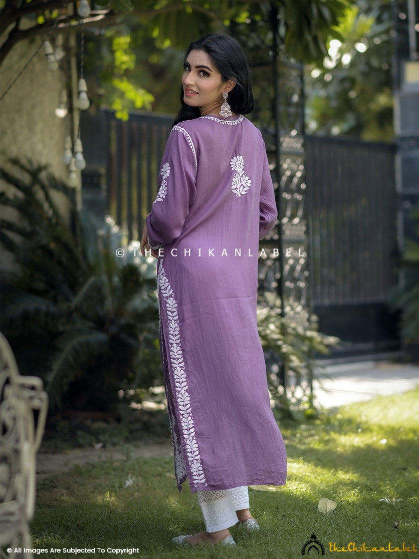 Hand-embroidered mauve modal kurti with white floral patterns