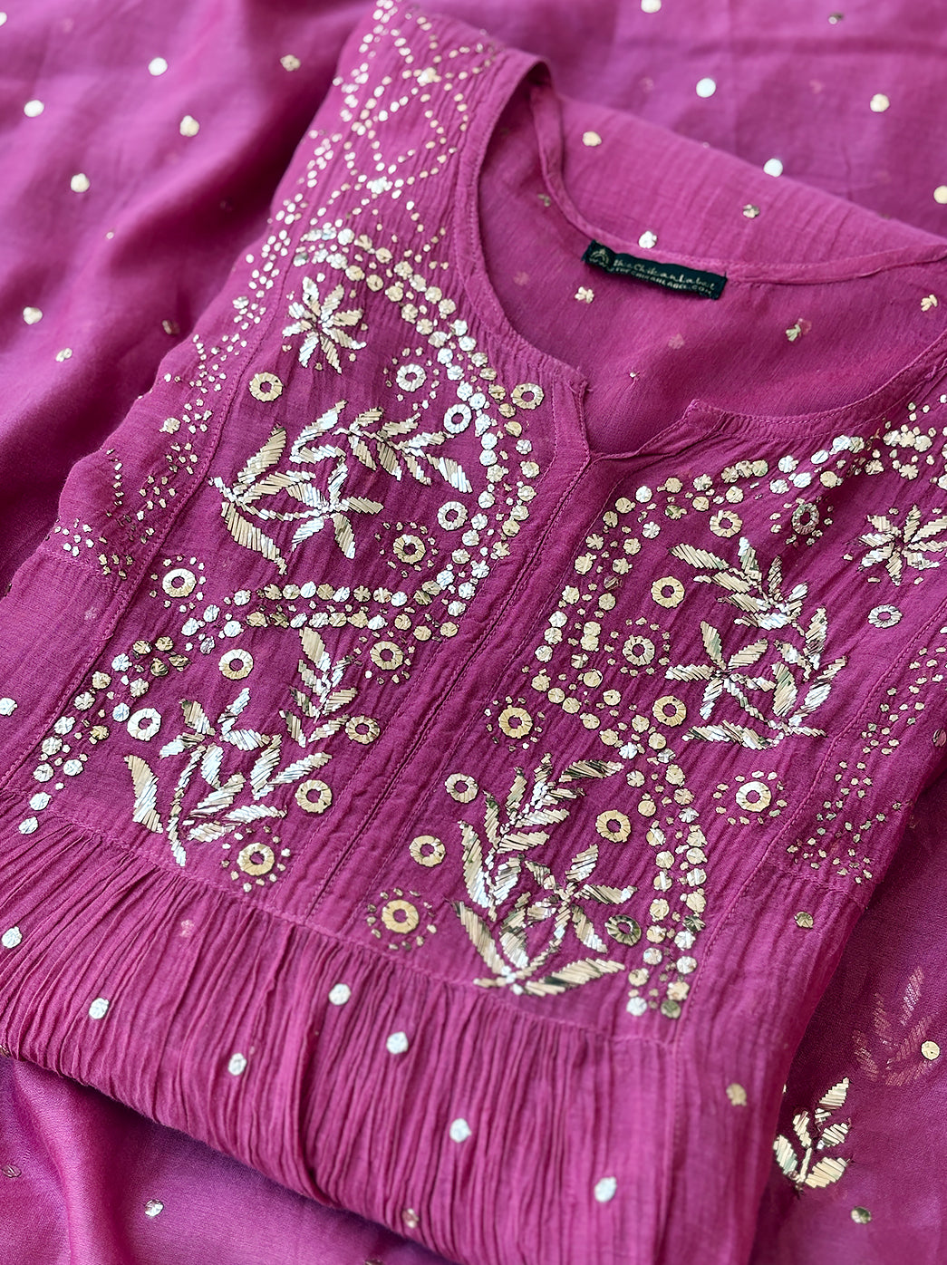 Luxe chikankari Anarkali kurti material crafted from soft Mulmul Chanderi fabric paired with matching dupatta and ornate neckline embroidery