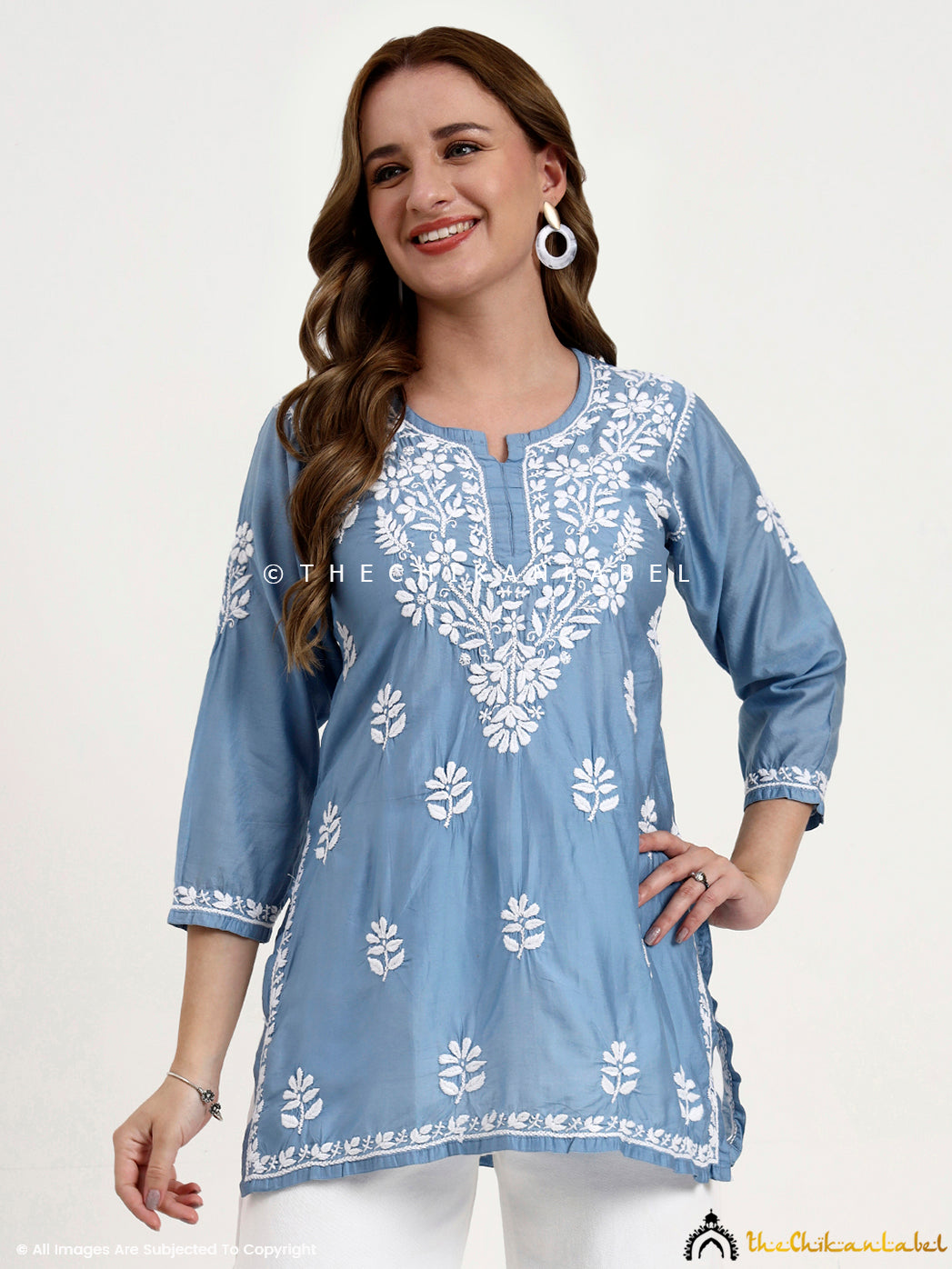Comfortable chikankari short kurti for women in Chanderi fabric with timeless embroidery.
