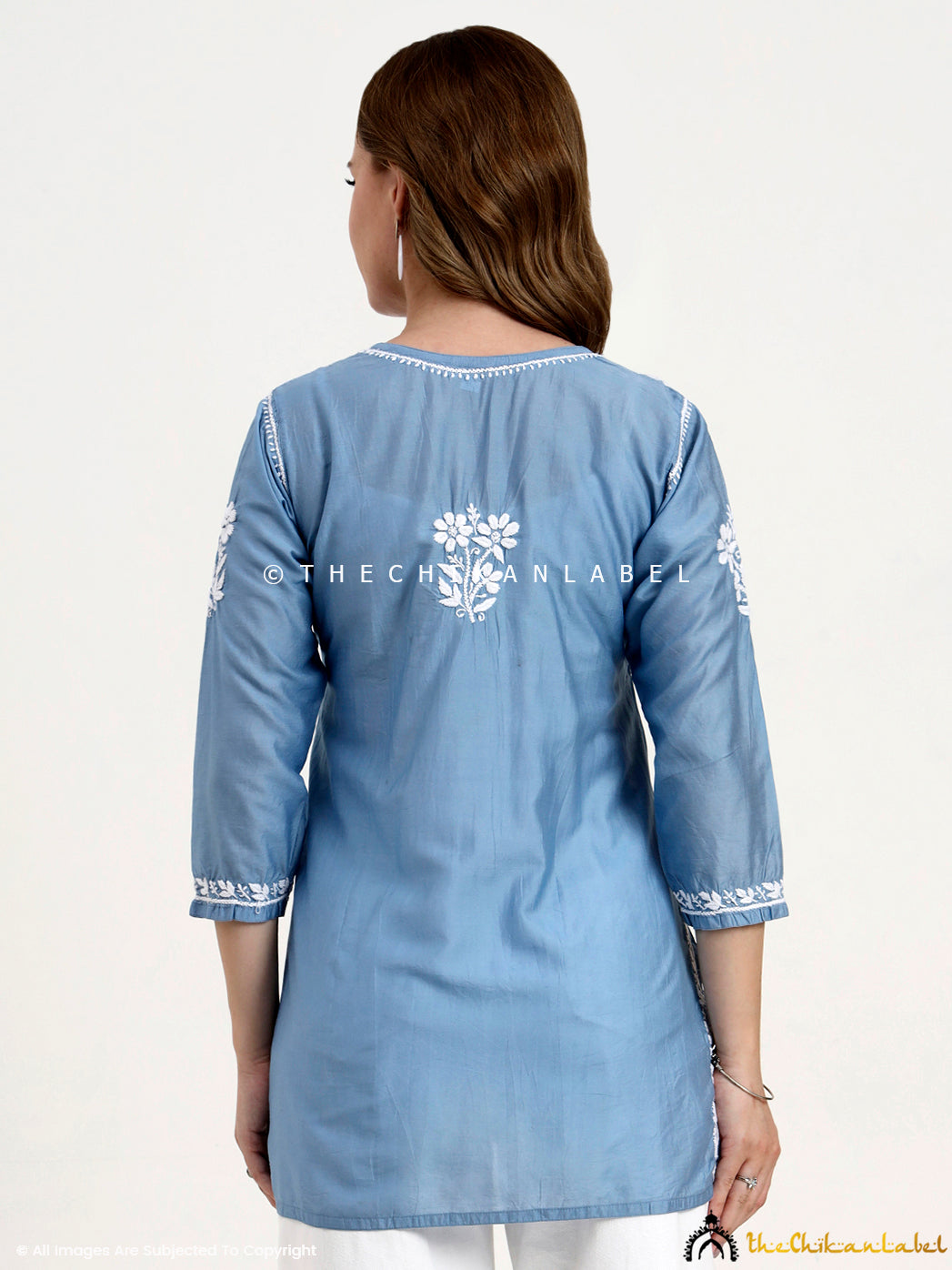 Trendy Chanderi chikankari kurti with artisan embroidery suitable for office, parties, and festive wear.