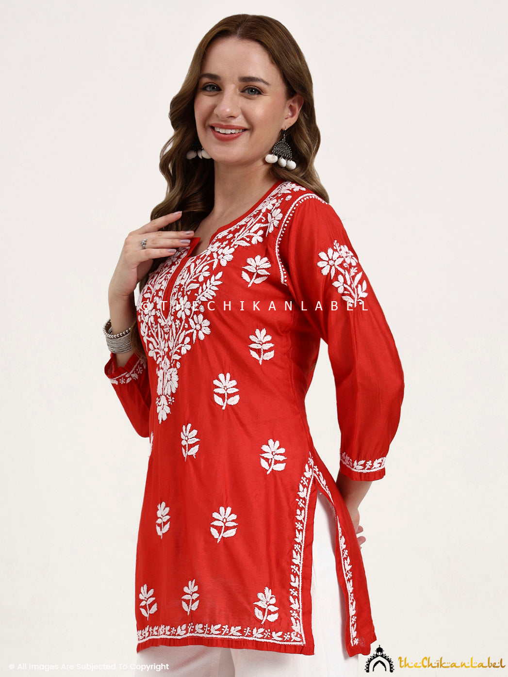 Elegant chikankari embroidered short kurti in Chanderi fabric styled for everyday comfort and festive charm.