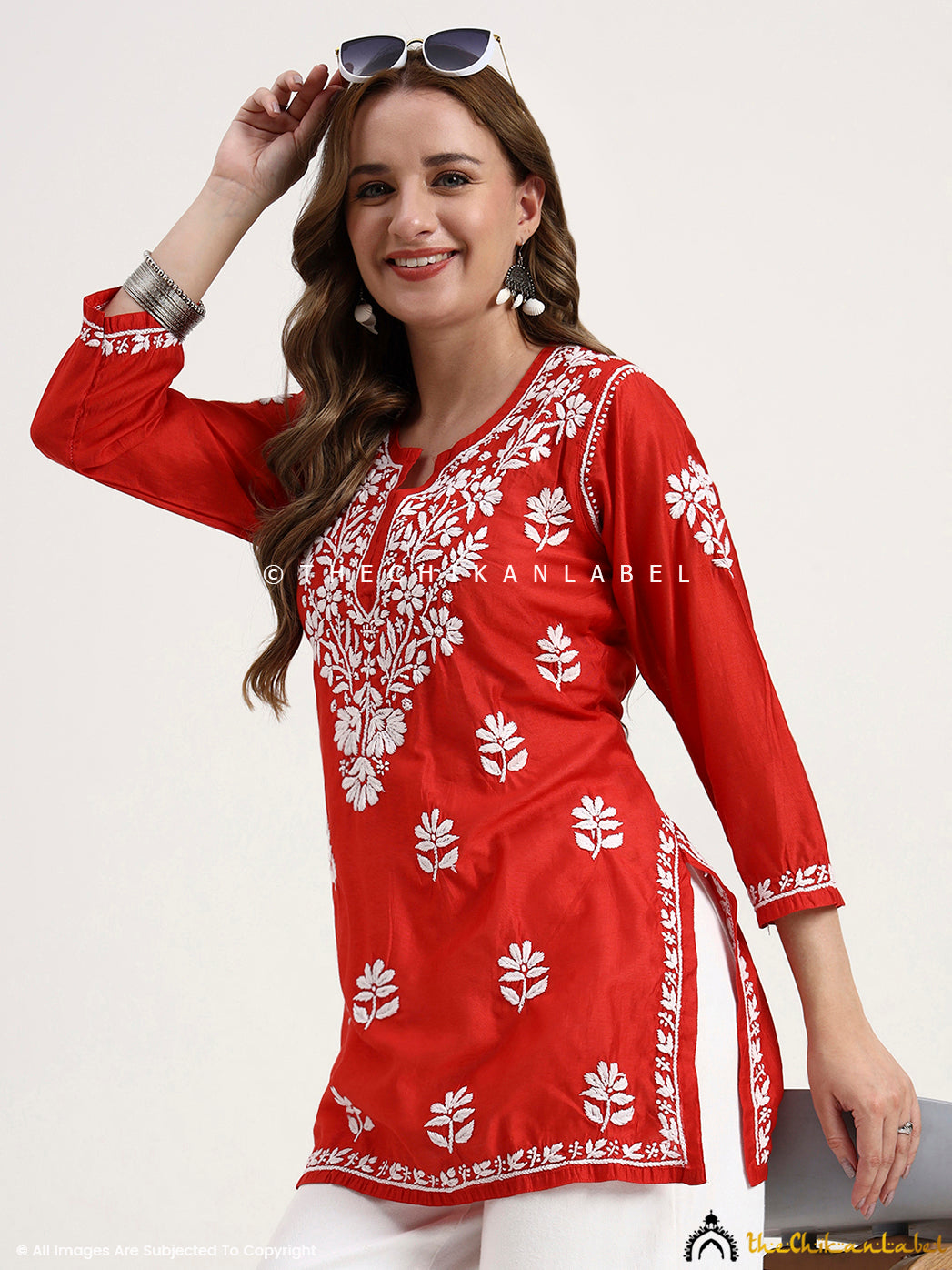 Stylish Chanderi chikankari kurti top with handcrafted embroidery details for versatile styling.