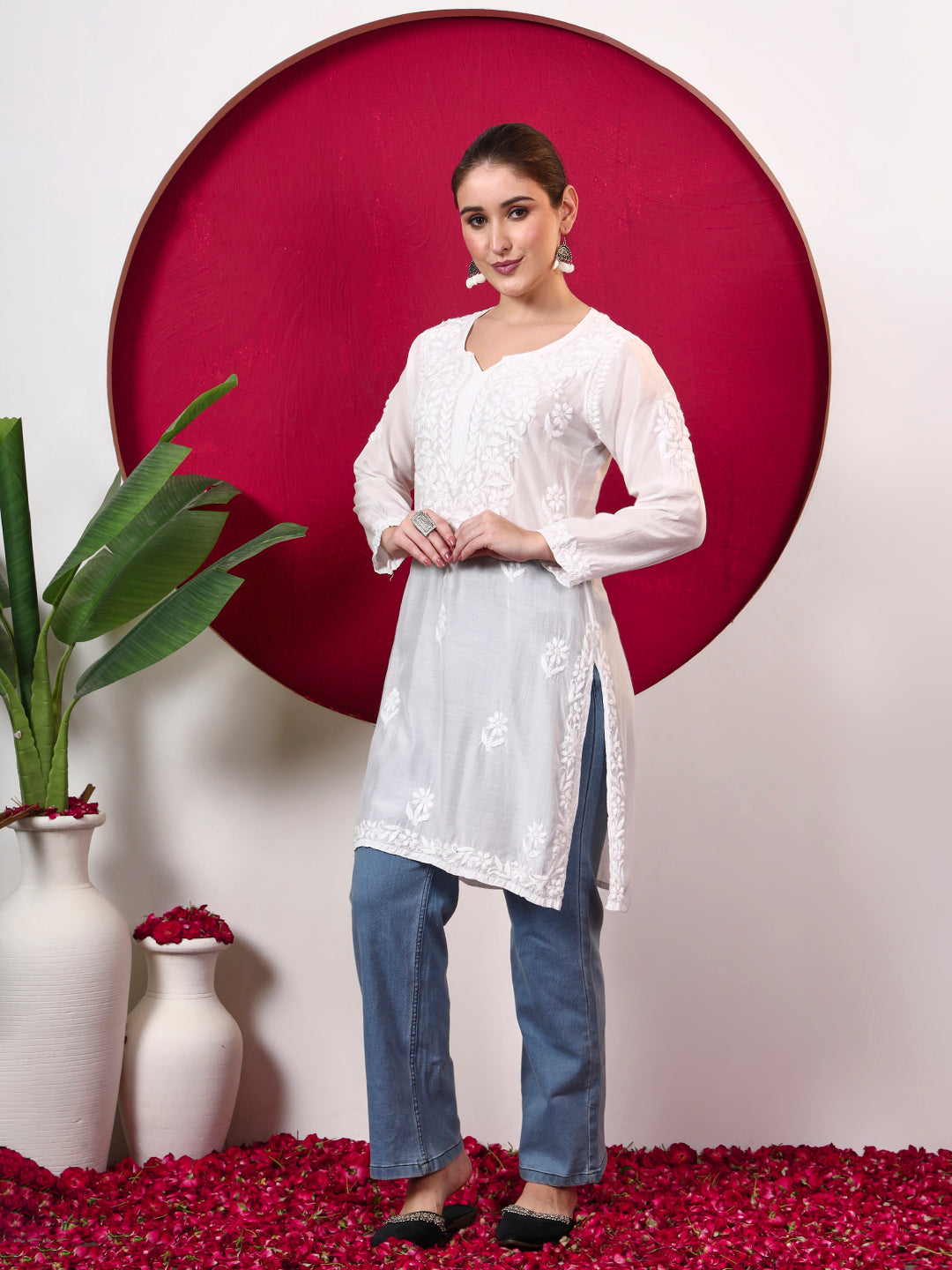 Megha Muslin Chikankari Straight Kurti with traditional embroidery across the neckline, front and hem, designed as a comfortable regular wear kurti.
