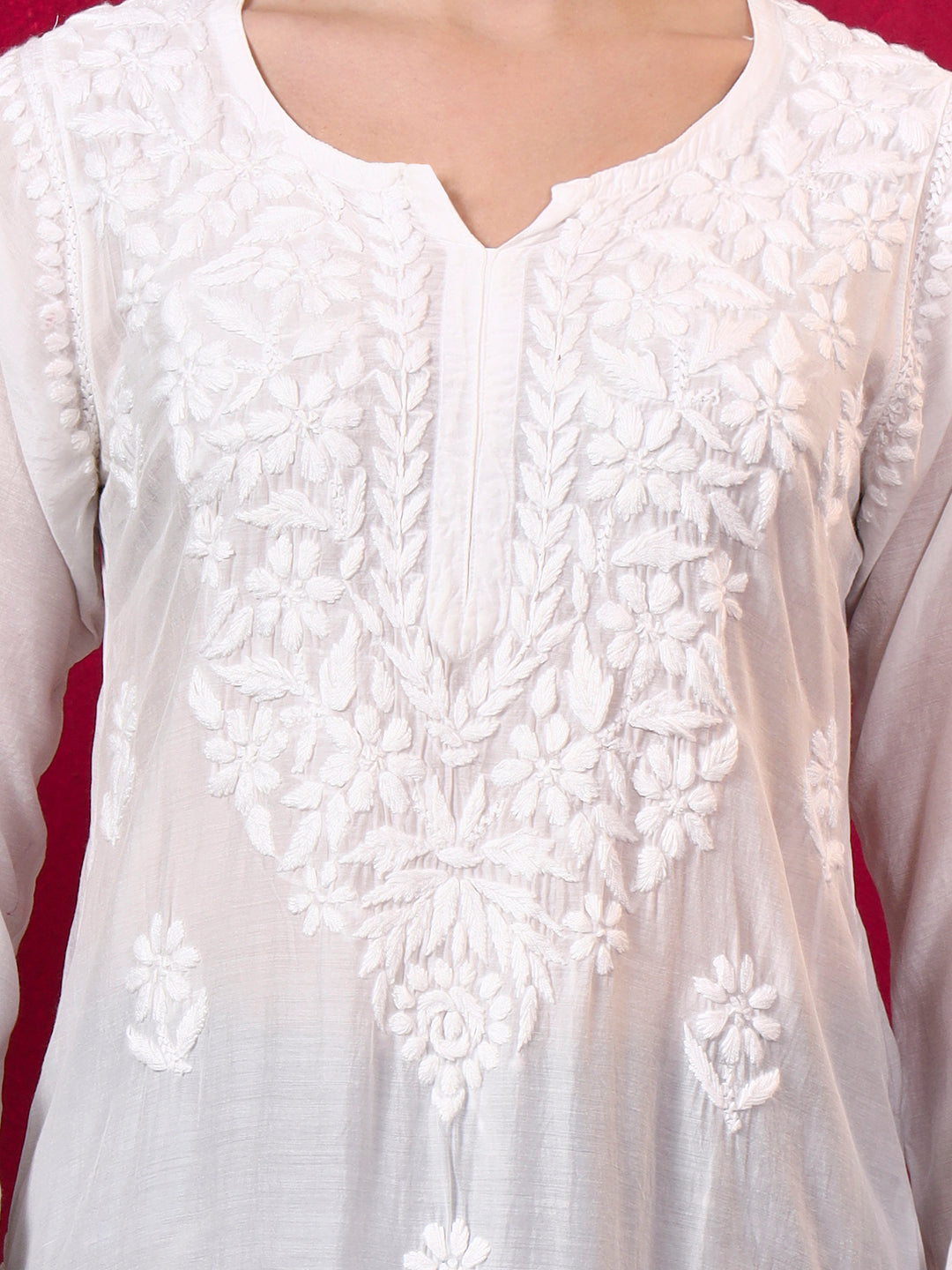 Women’s Megha Muslin Straight Kurti with intricate floral Chikankari embroidery, breathable muslin fabric and comfortable straight fit for office and casual wear.