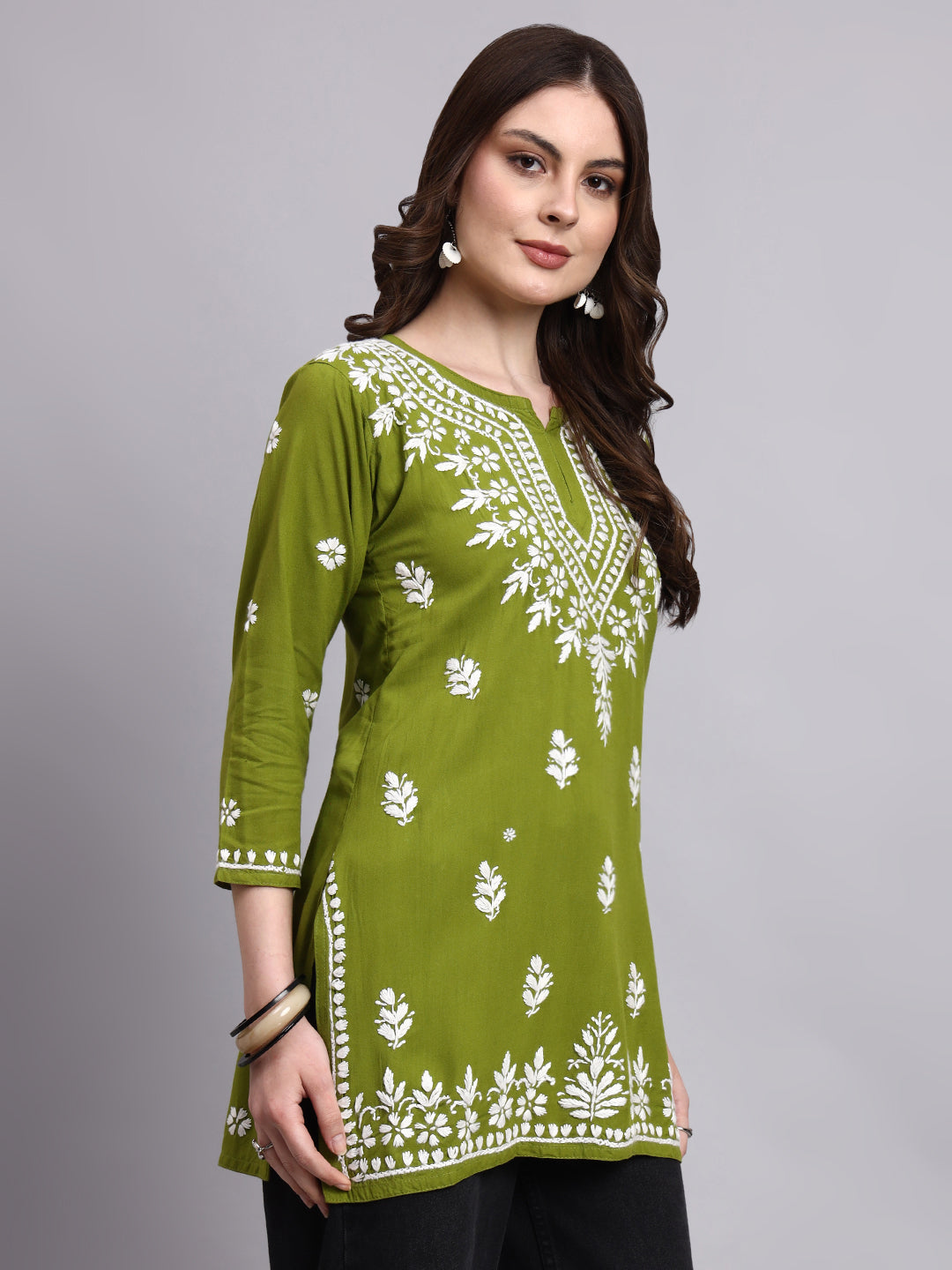 Trending short top designed as a rayon kurta with delicate handmade chikankari work