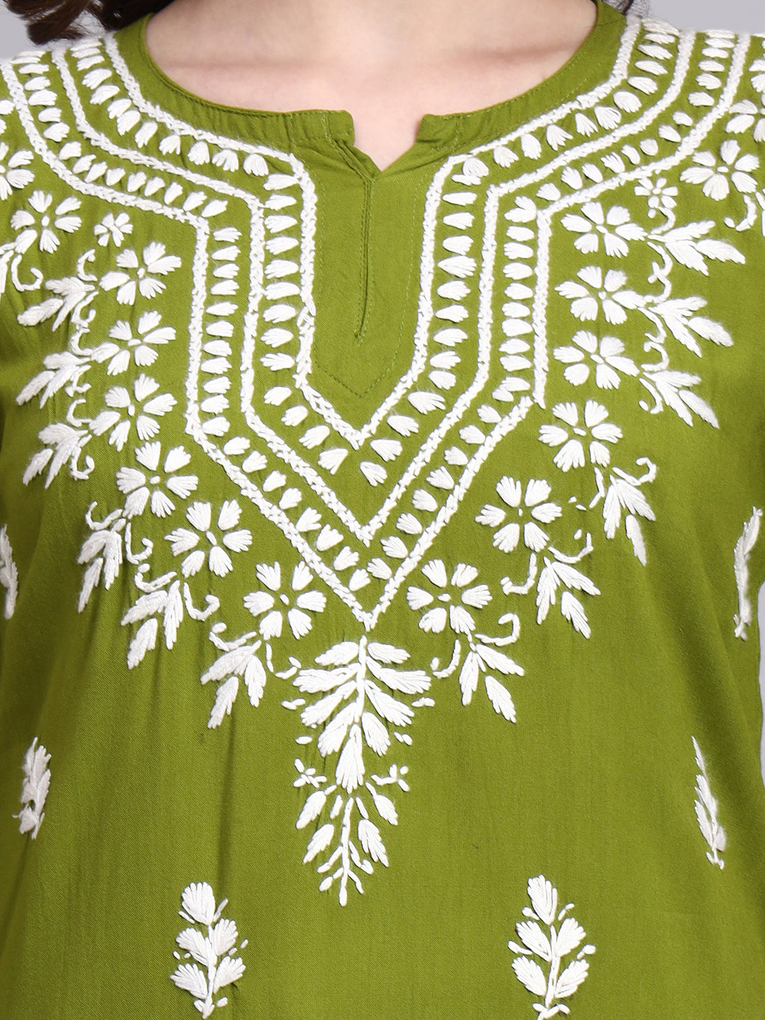 Rayon short kurta with handcrafted chikankari embroidery featuring floral motifs and traditional neckline detailing