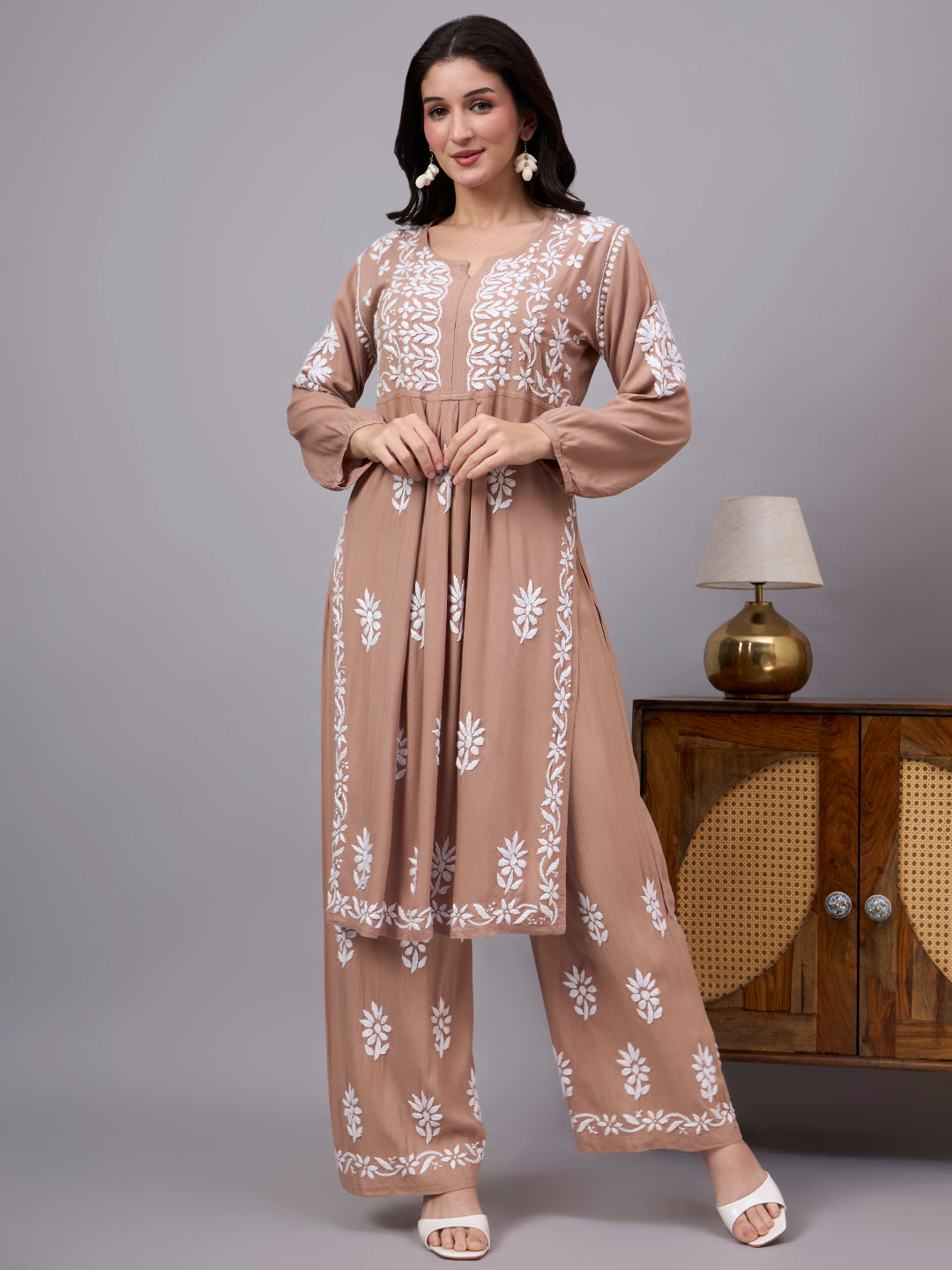 Elegant comfortable regular wear kurta palazzo set showcasing traditional Chikankari embroidery, premium rayon construction, and a graceful A-line design for modern women.