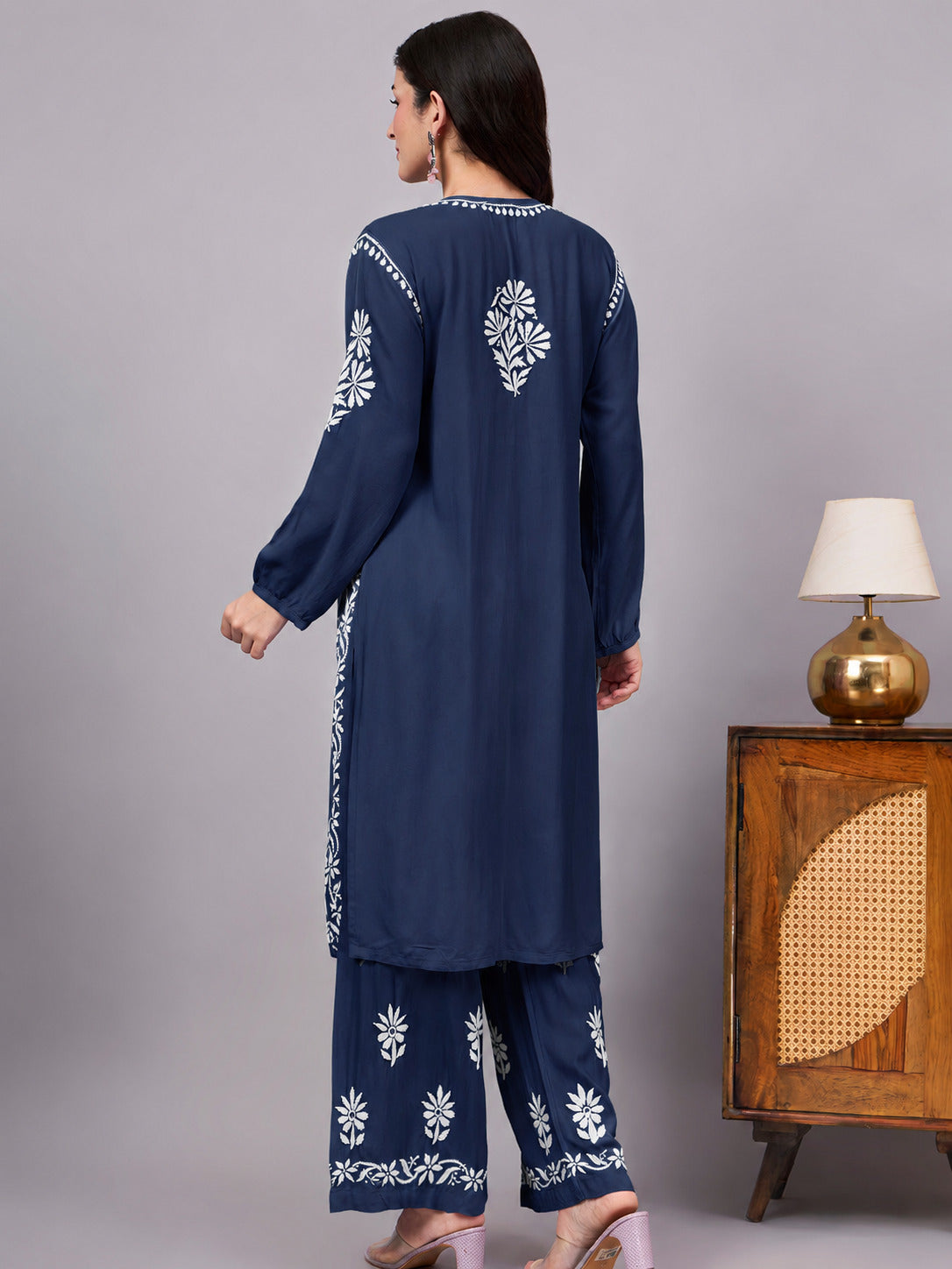 Elegant comfortable regular wear kurta palazzo set showcasing traditional Chikankari embroidery, premium rayon construction, and a graceful A-line design for modern women.