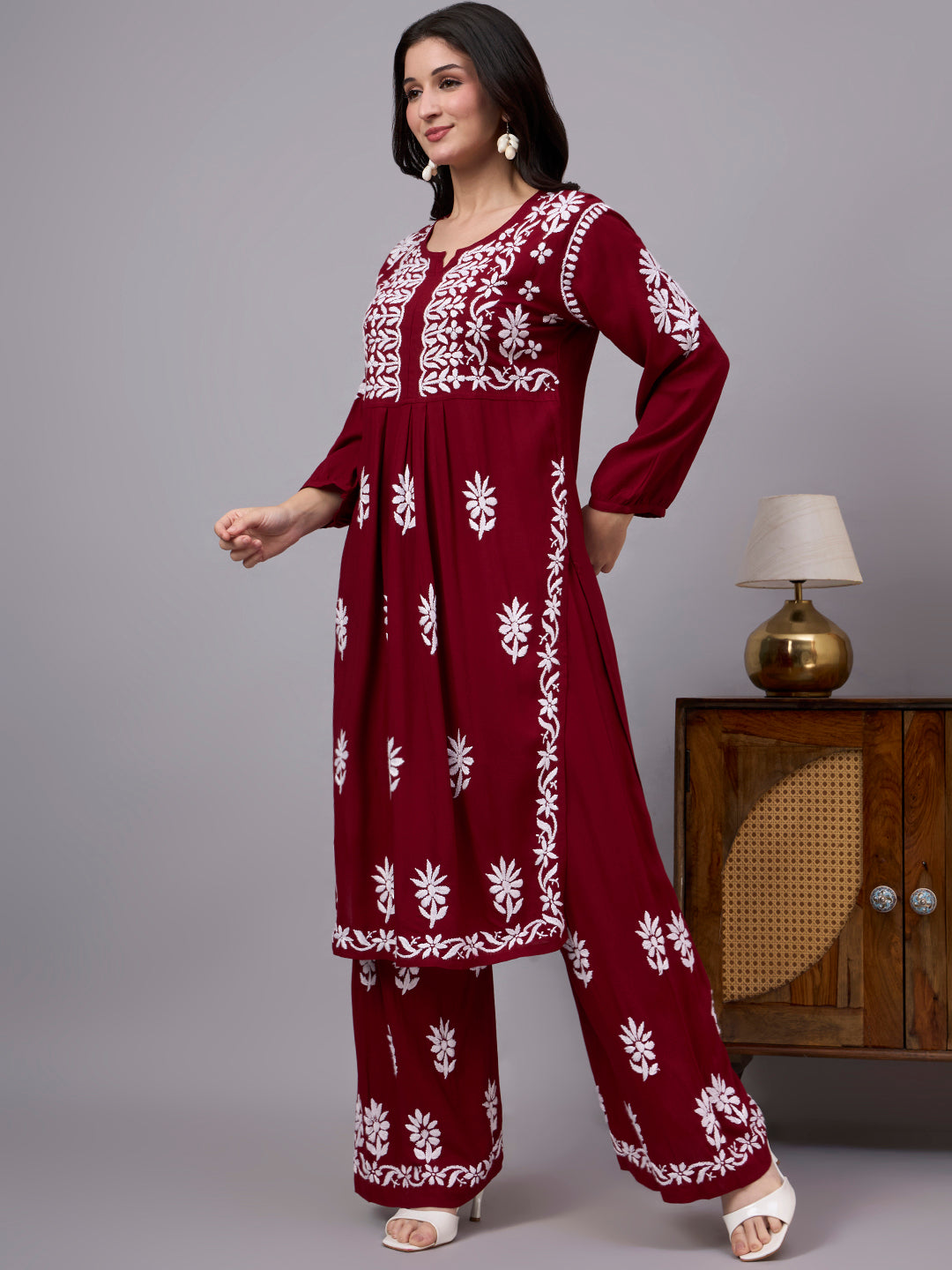 Elegant comfortable regular wear kurta palazzo set showcasing traditional Chikankari embroidery, premium rayon construction, and a graceful A-line design for modern women.