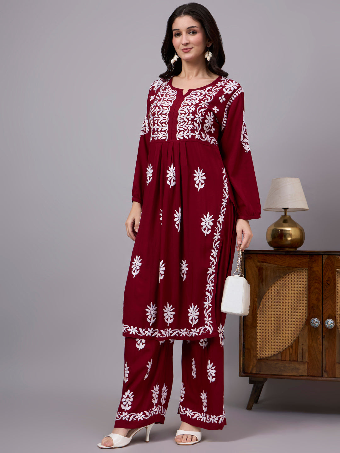 Authentic Rayon A-Line Kurta Set featuring handcrafted Lucknow Chikankari work, a flattering silhouette, and coordinated embroidered palazzo for versatile ethnic styling.