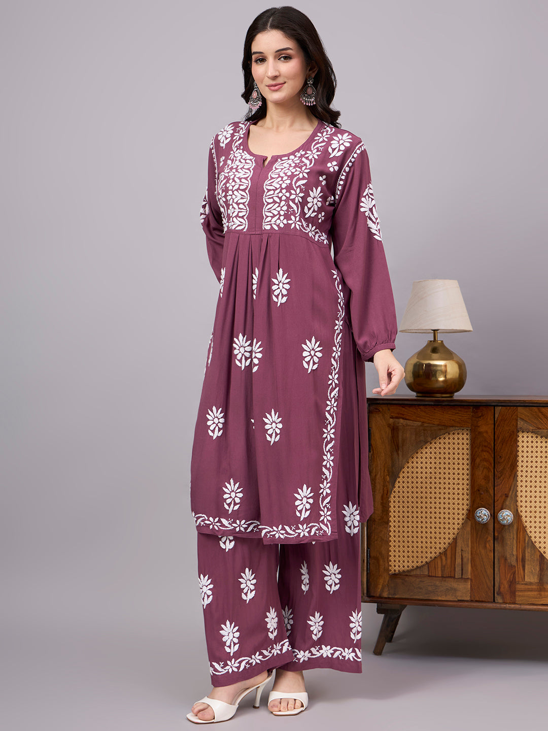 Elegant comfortable regular wear kurta palazzo set showcasing traditional Chikankari embroidery, premium rayon construction, and a graceful A-line design for modern women.