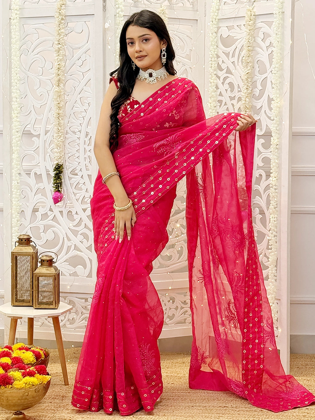 Elegant semi-organza chikankari saree with handcrafted mukaish embroidery for festive and wedding wear.