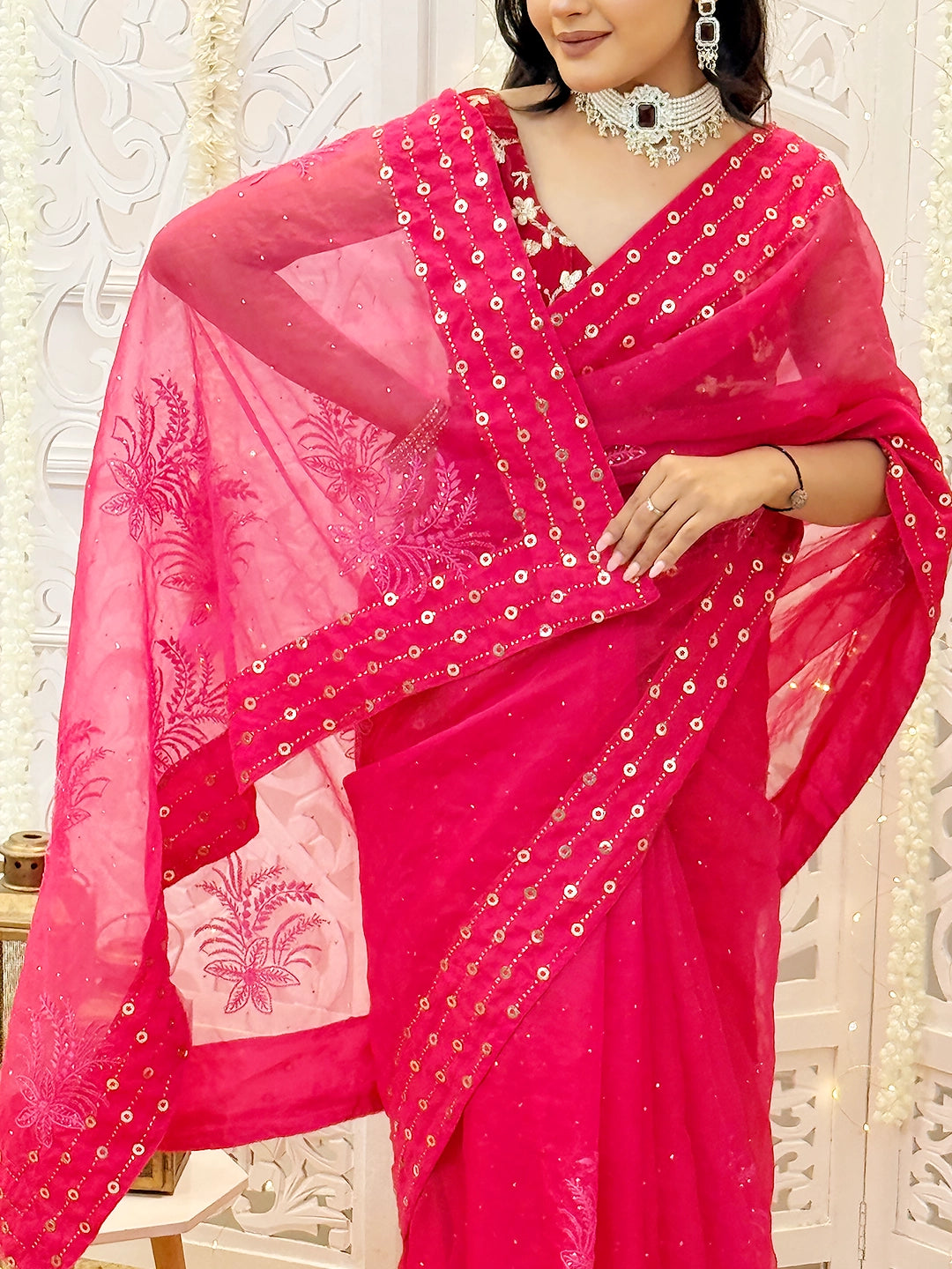 Hand-embroidered chikankari saree in premium semi-organza fabric with traditional mukaish detailing.