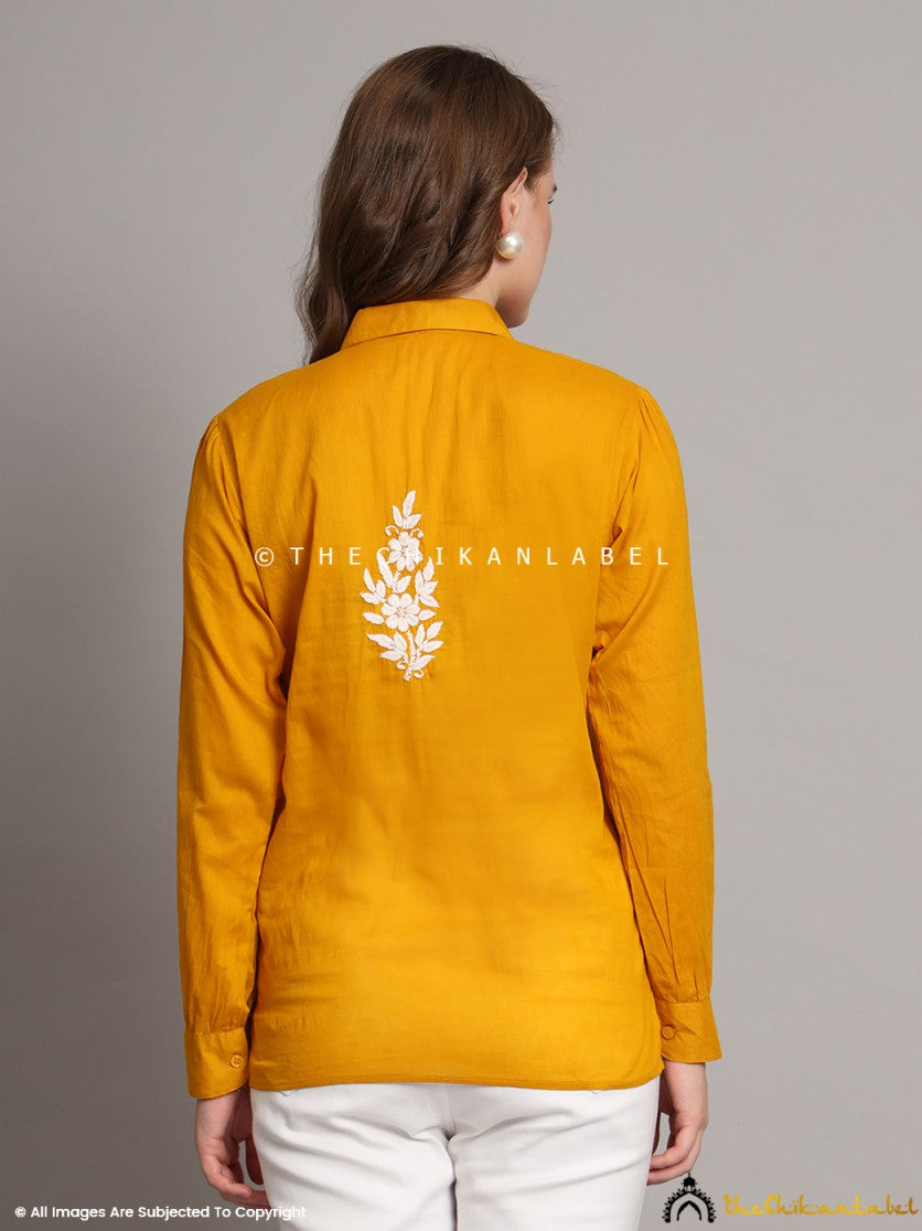 Back view of mustard mulmul shirt showing relaxed fit and finishing