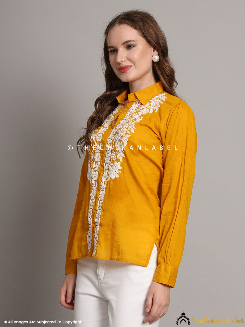 Side view of mustard yellow cotton chikankari shirt for women