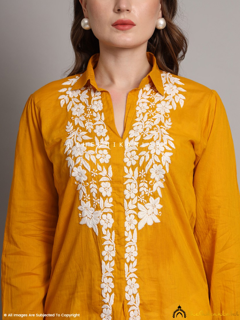 Front view of mustard chikankari shirt with floral hand embroidery