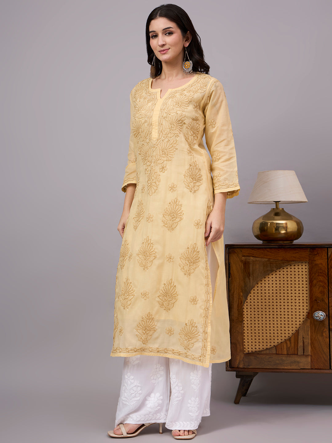 Women's handcrafted Cotton Straight Kurti with authentic floral Chikankari embroidery, comfortable regular fit, and breathable fabric for daily wear and festive occasions.