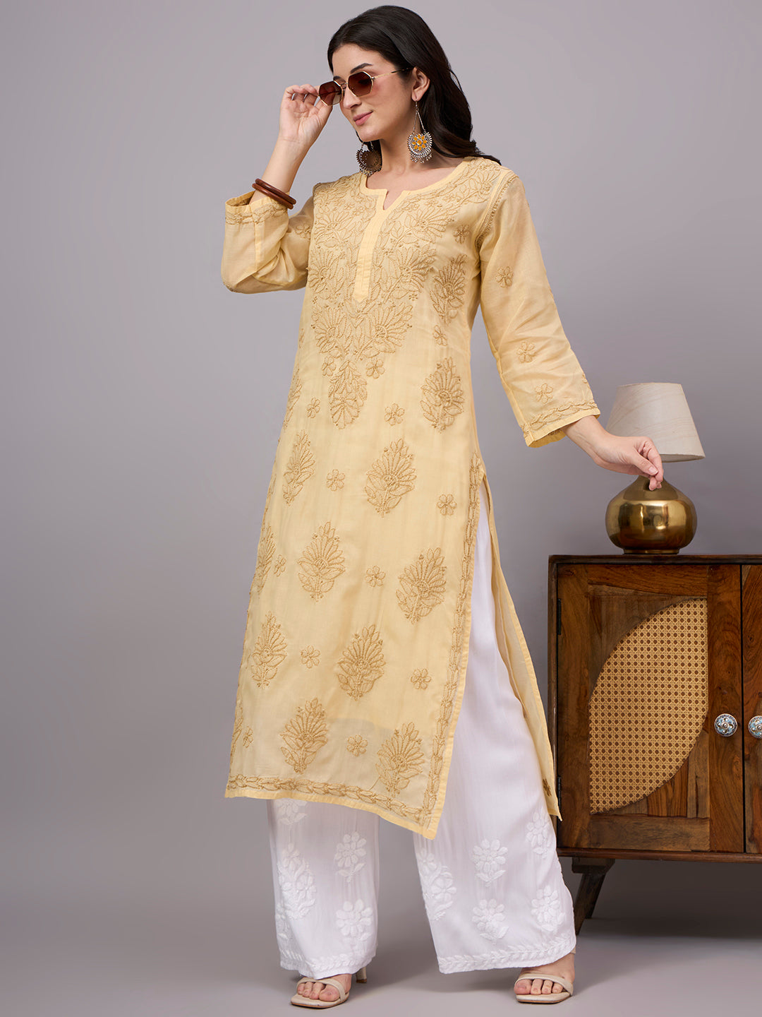 Comfortable regular wear Chikankari Kurta made from premium cotton fabric with handcrafted embroidery and an attached inner for enhanced comfort and coverage.