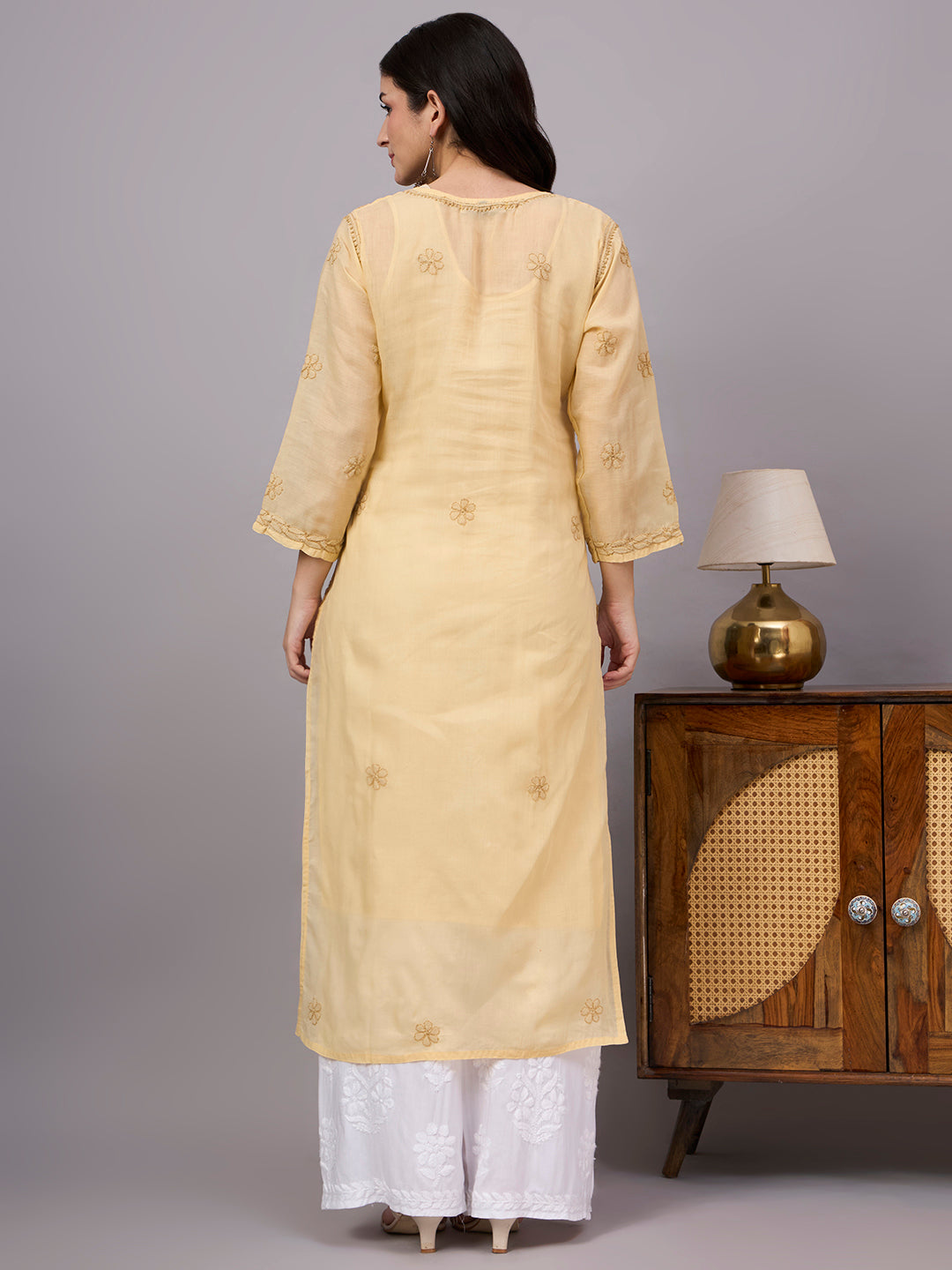 Elegant Chikankari Kurta crafted from premium cotton with a soft attached inner, showcasing traditional Lucknow embroidery for timeless ethnic fashion.