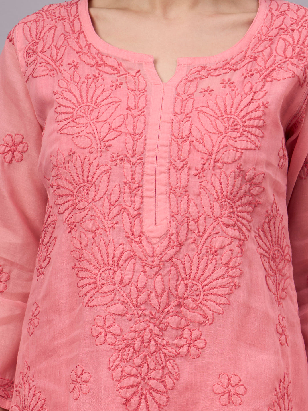 Elegant comfortable regular wear kurti with premium cotton fabric, handcrafted Chikankari embroidery, attached inner, and a straight-cut silhouette for daily fashion.