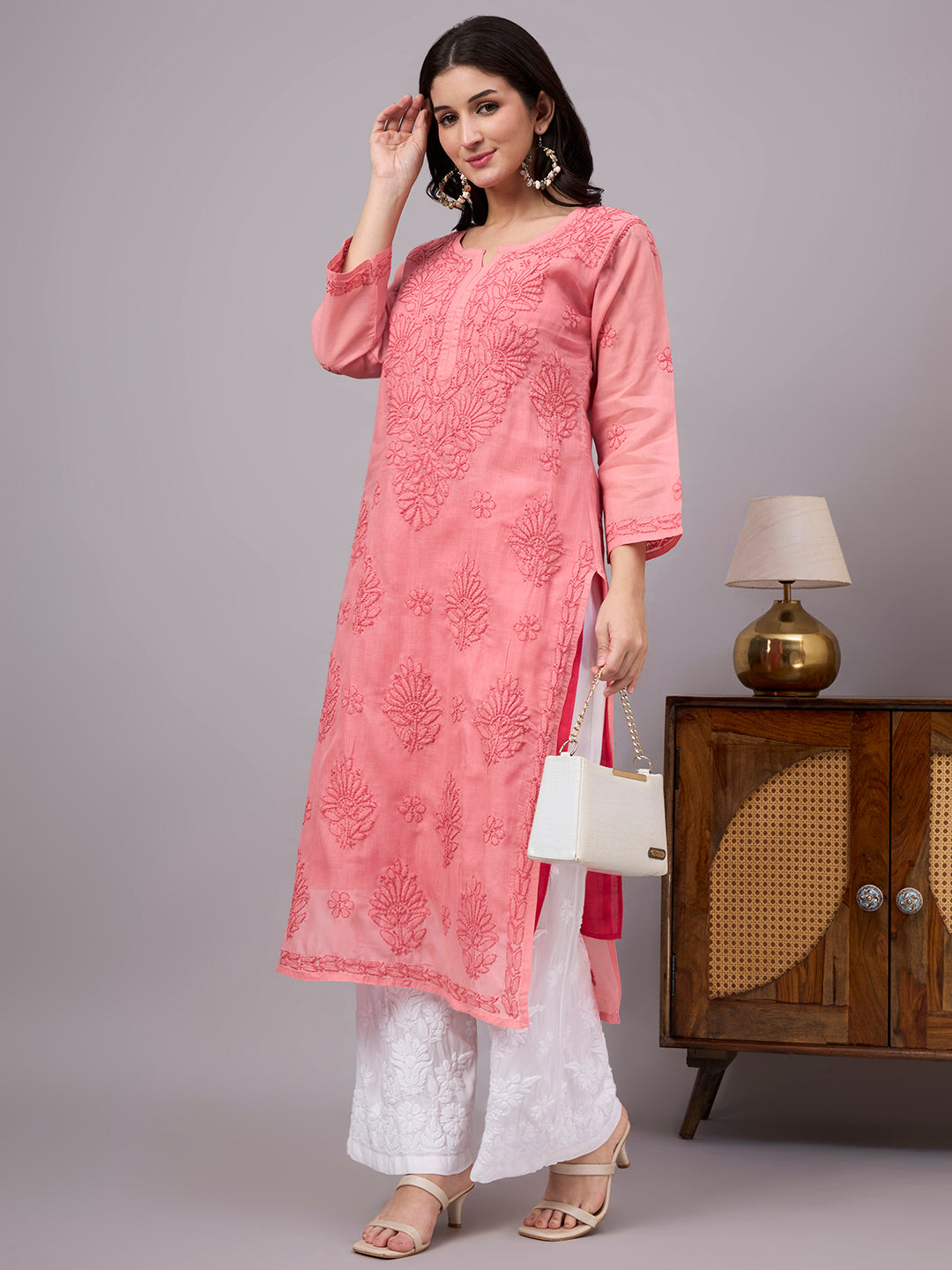 Elegant Chikankari Kurta crafted from premium cotton with a soft attached inner, showcasing traditional Lucknow embroidery for timeless ethnic fashion.