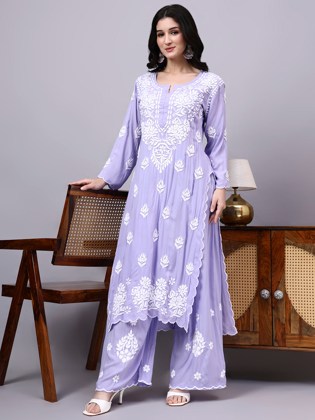 Premium comfortable regular wear set with handcrafted Chikankari embroidery, relaxed silhouette, and matching palazzo designed for everyday ethnic elegance.
